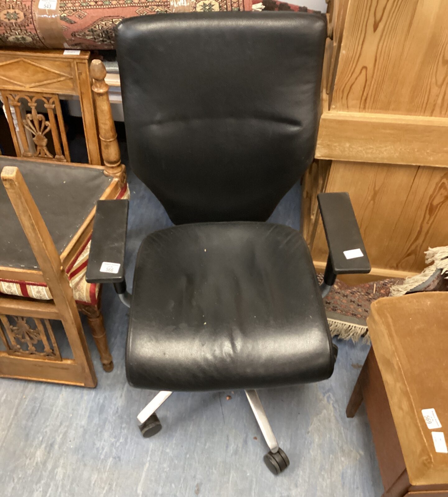 Black leather swivel office chair