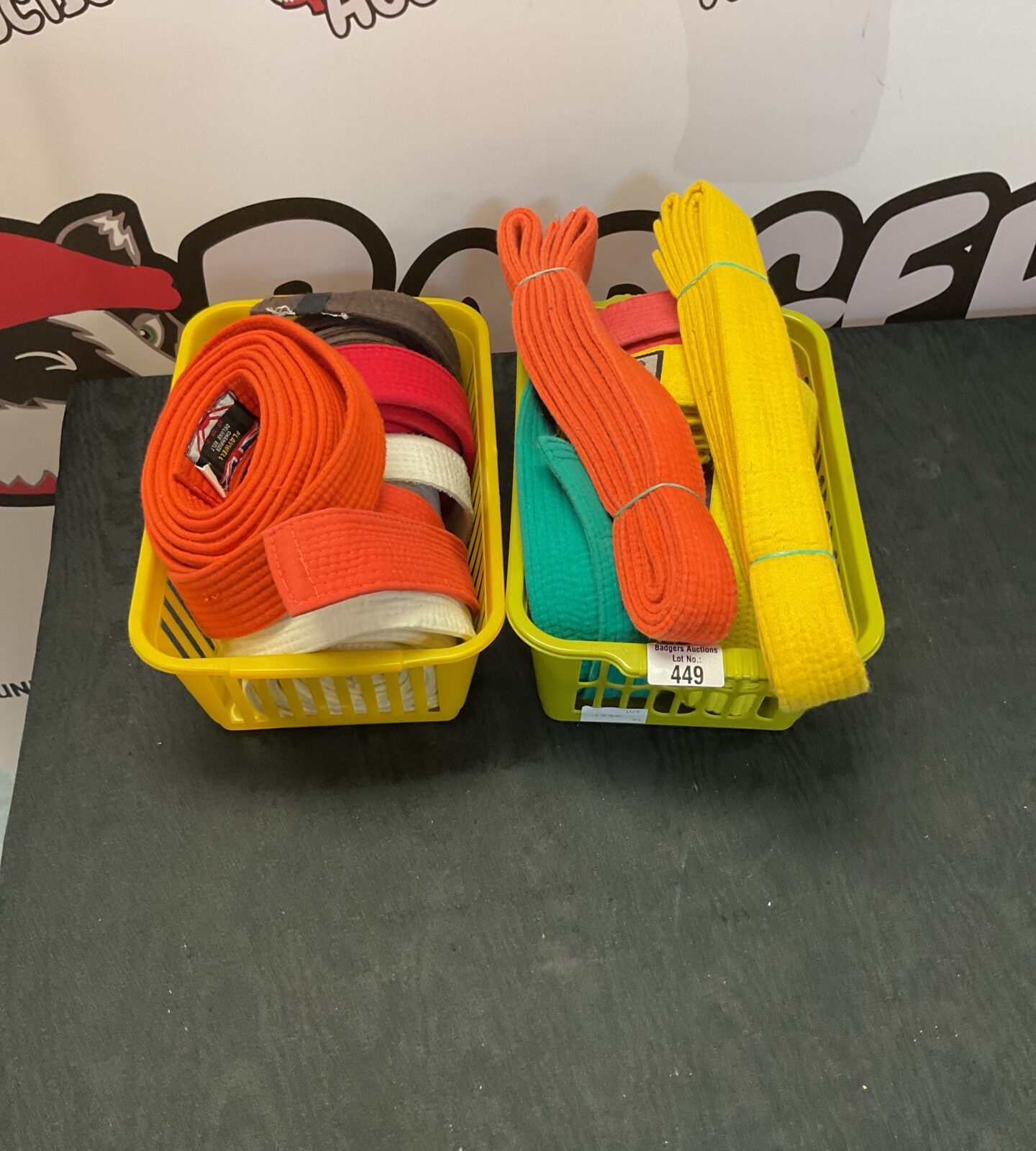 Two boxes of mixed karate belts
