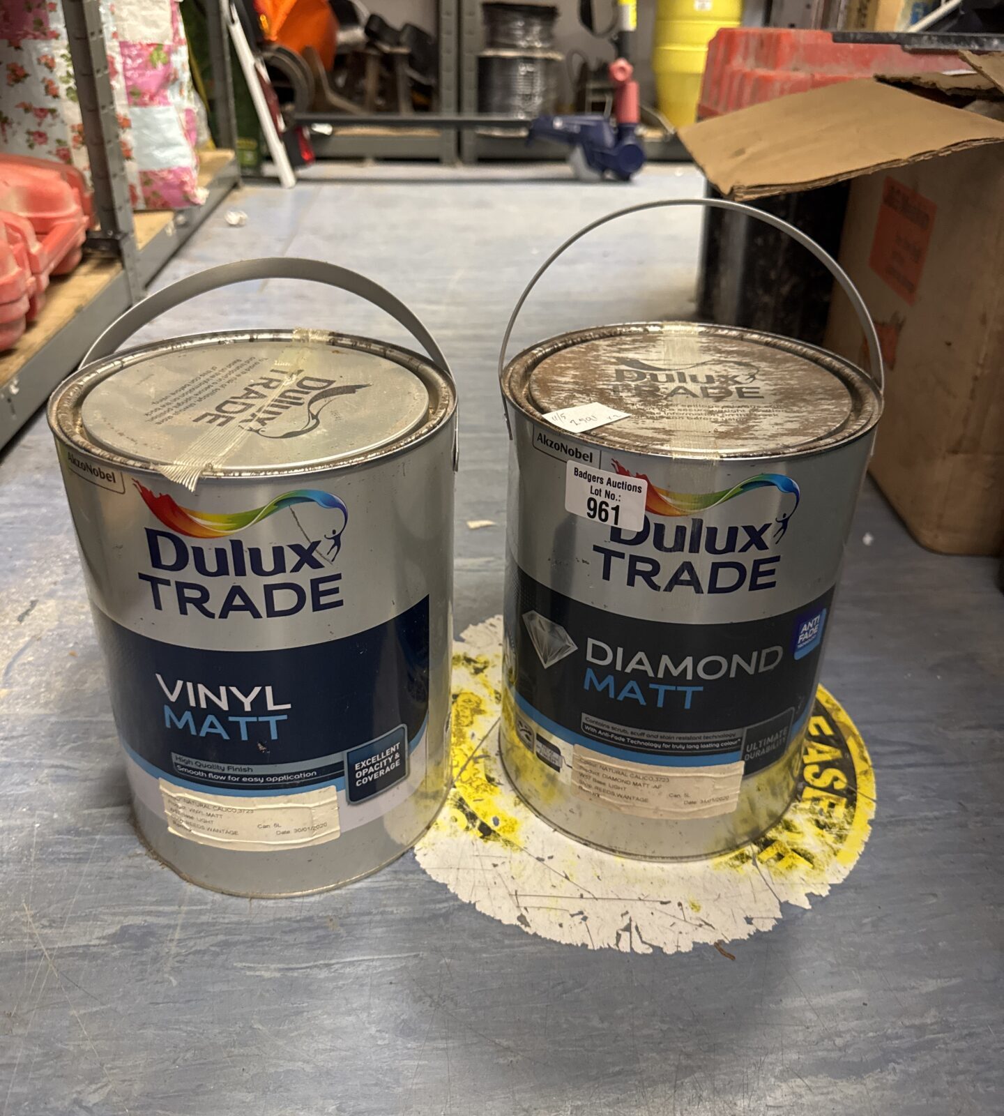 Two sealed tins of dulux trade paint