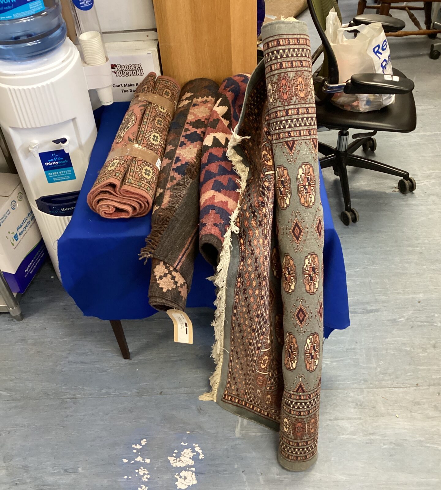 Four rugs of assorted sizes & patterns