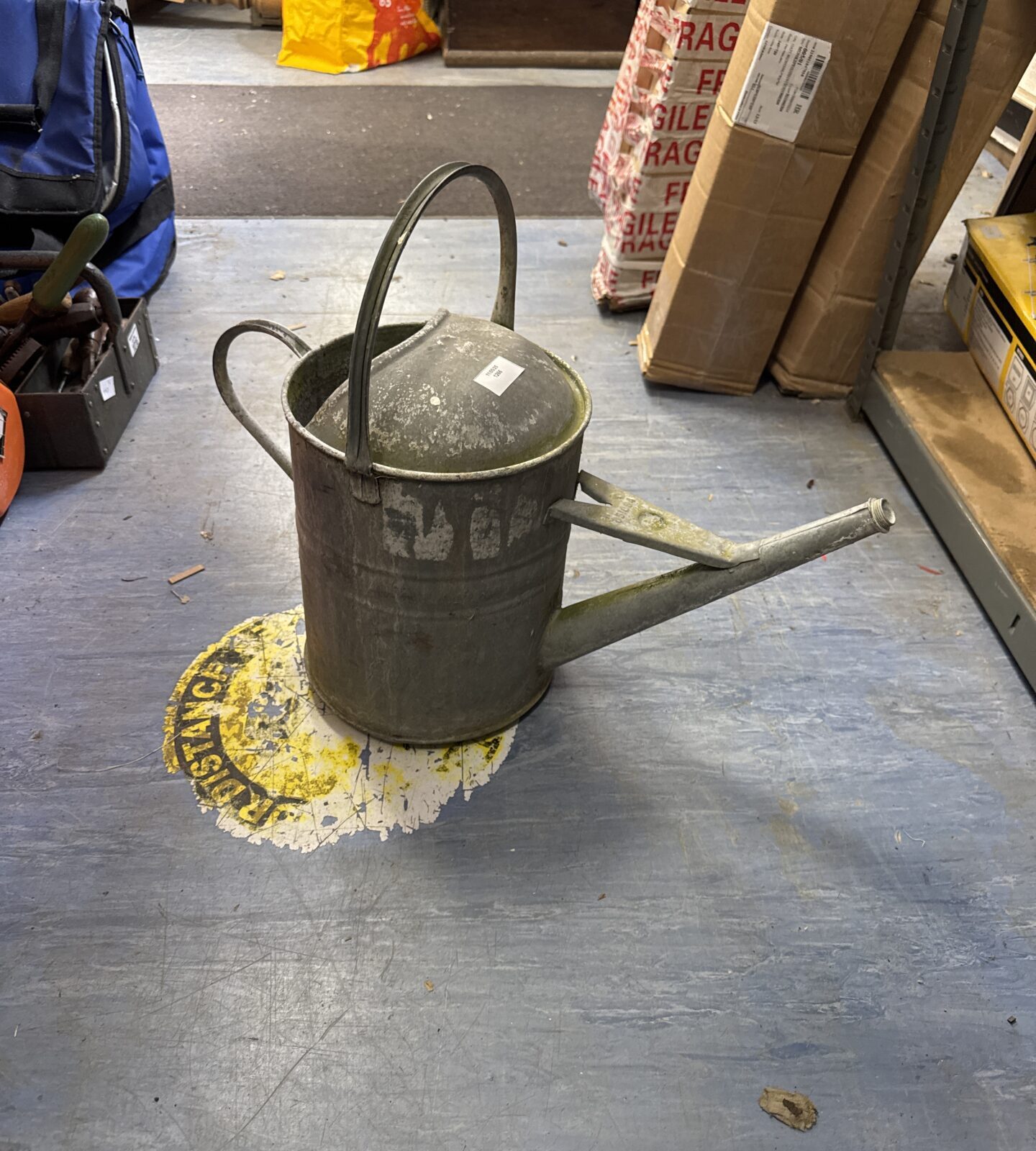 Vintage galvanised watering can