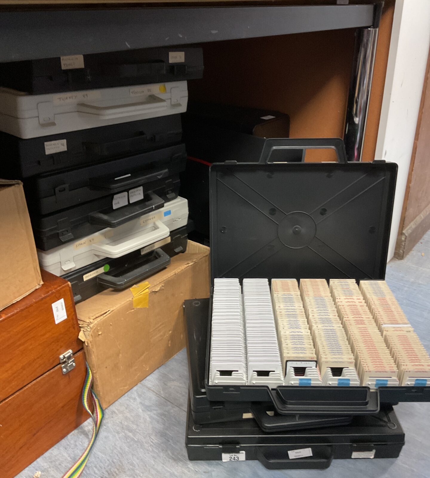 10 cases of 35mm slides with projector