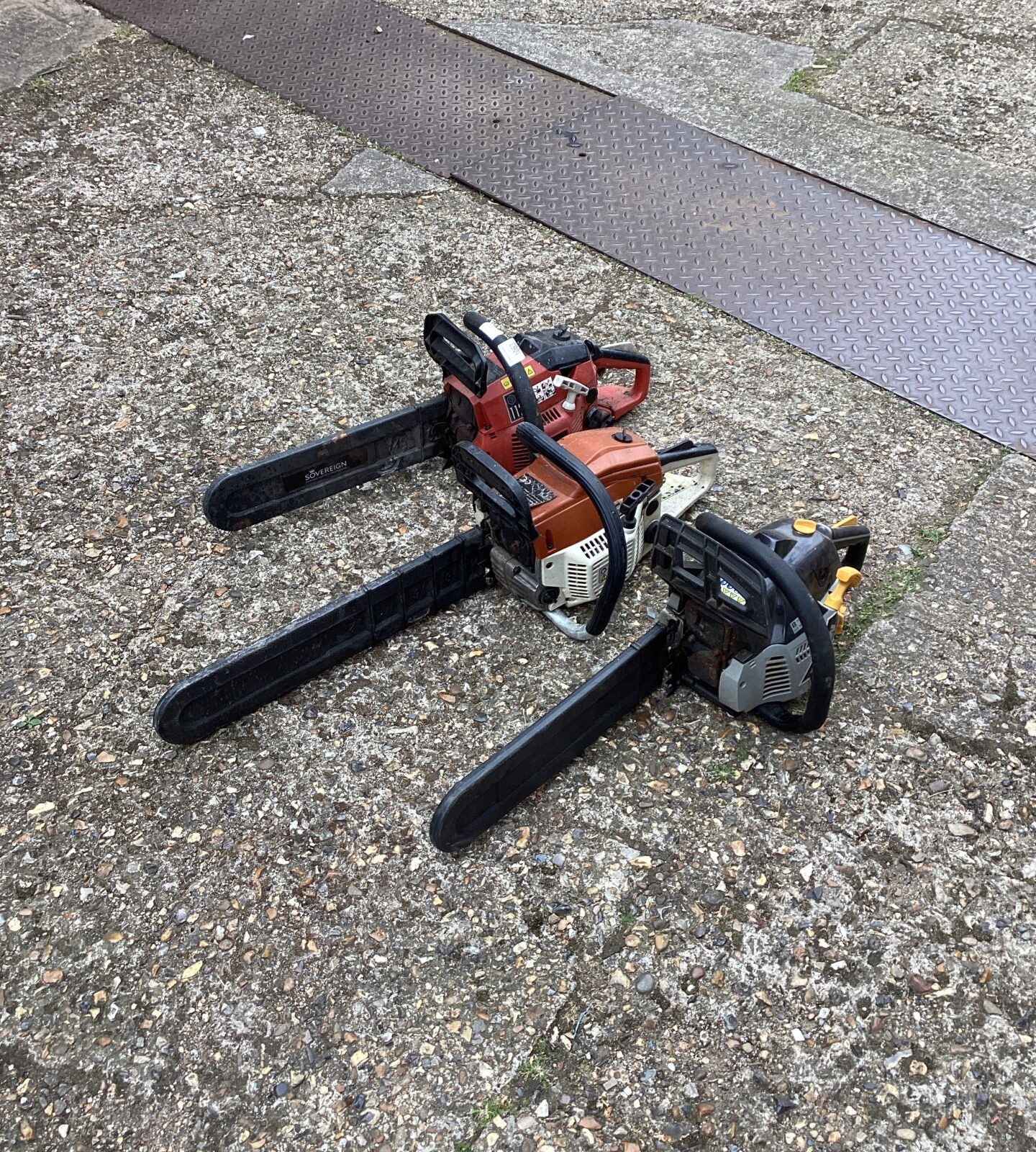 Three petrol chainsaws sold as seen