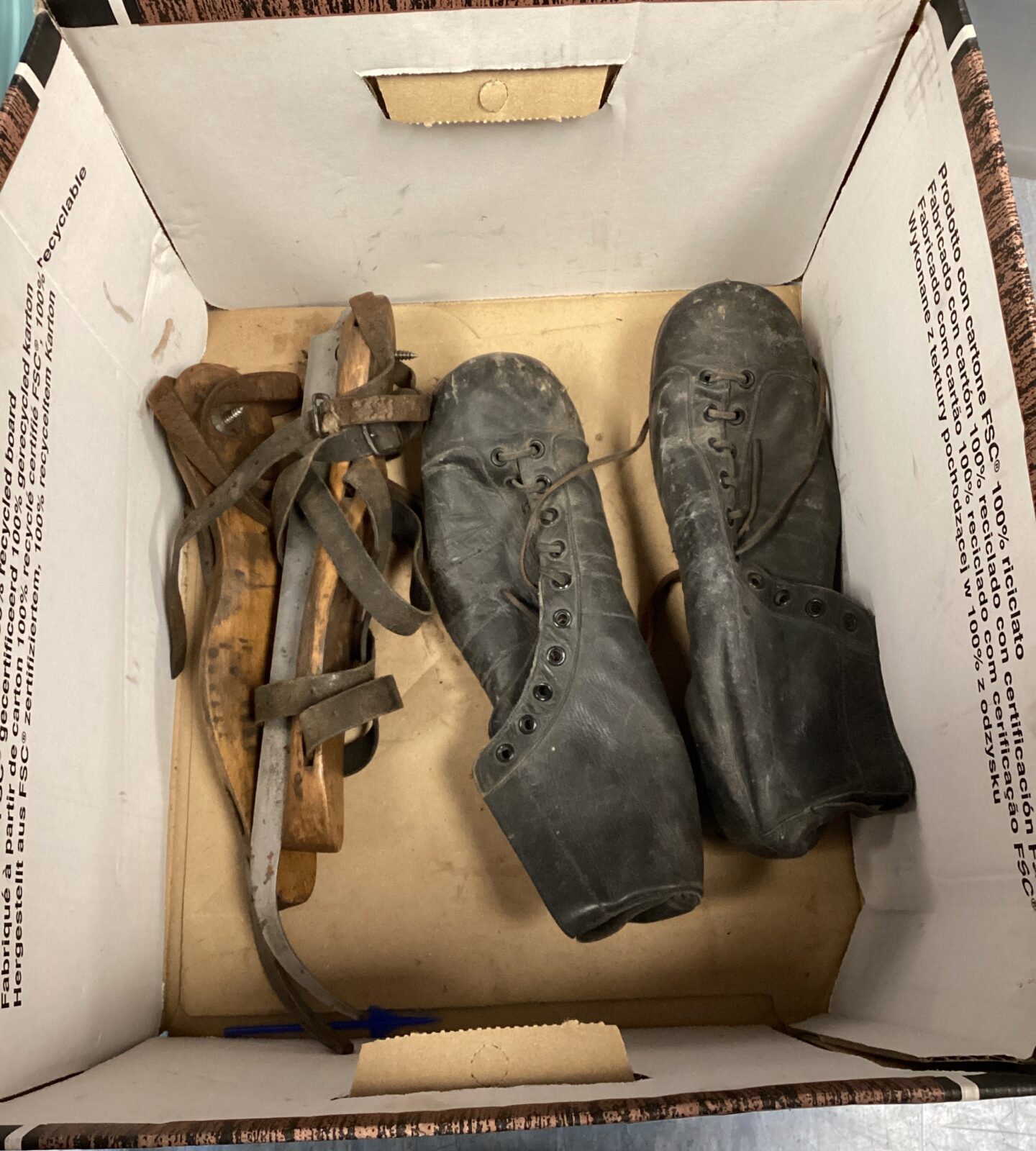 pair vintage boots and skates