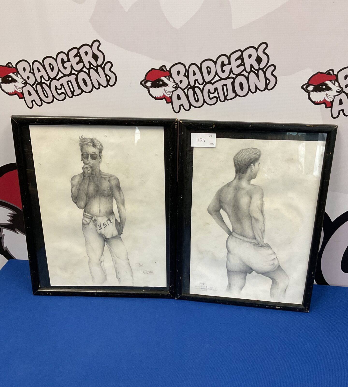 Pair of original signed pencil drawings of a male model