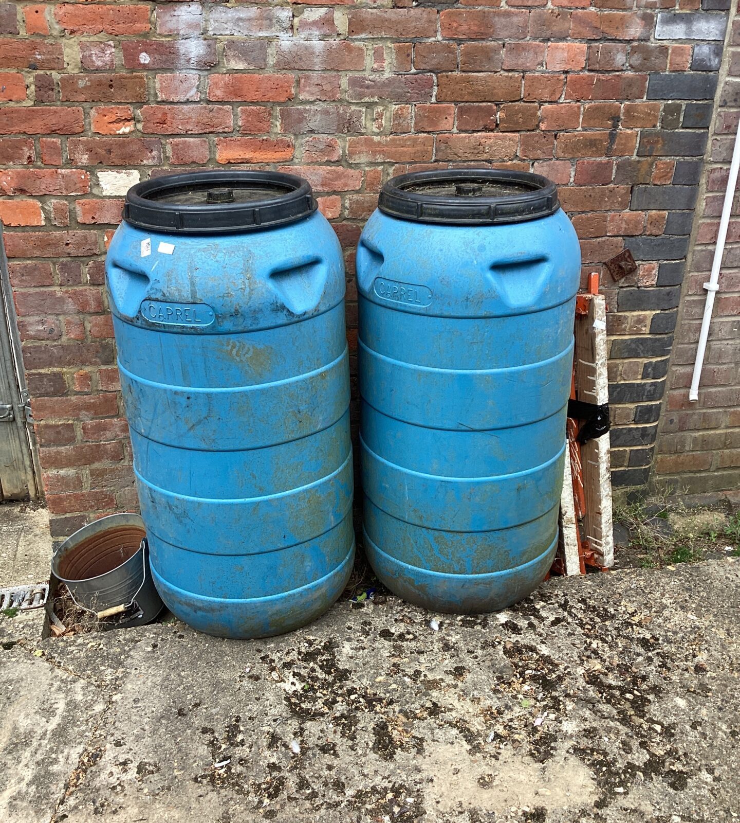 Two plastic water butts