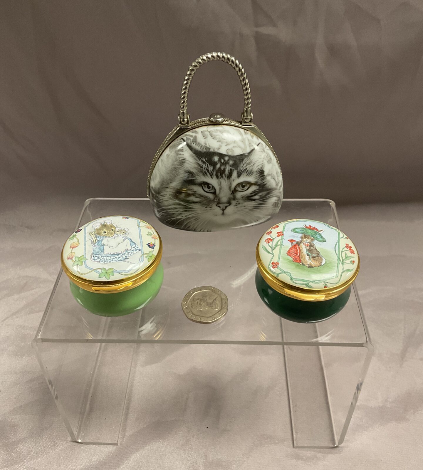 Two royal Doulton Pill pots and regency cat handbag trinket pot