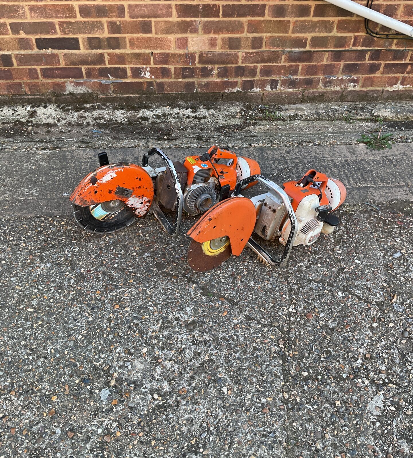 Two stihl petrol stone cutters