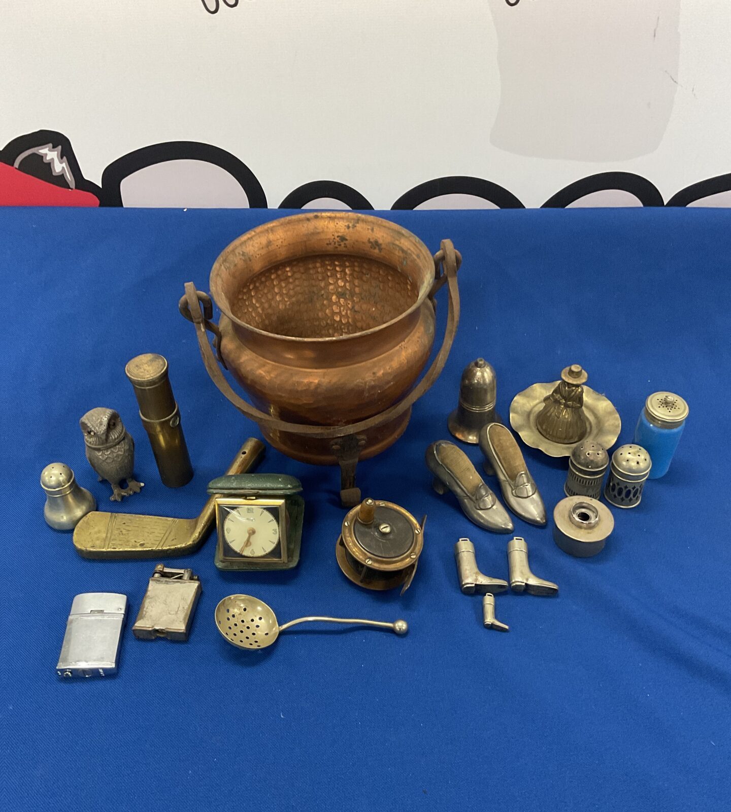 Vintage copper cauldron with curios including pin cushions & fishing reel