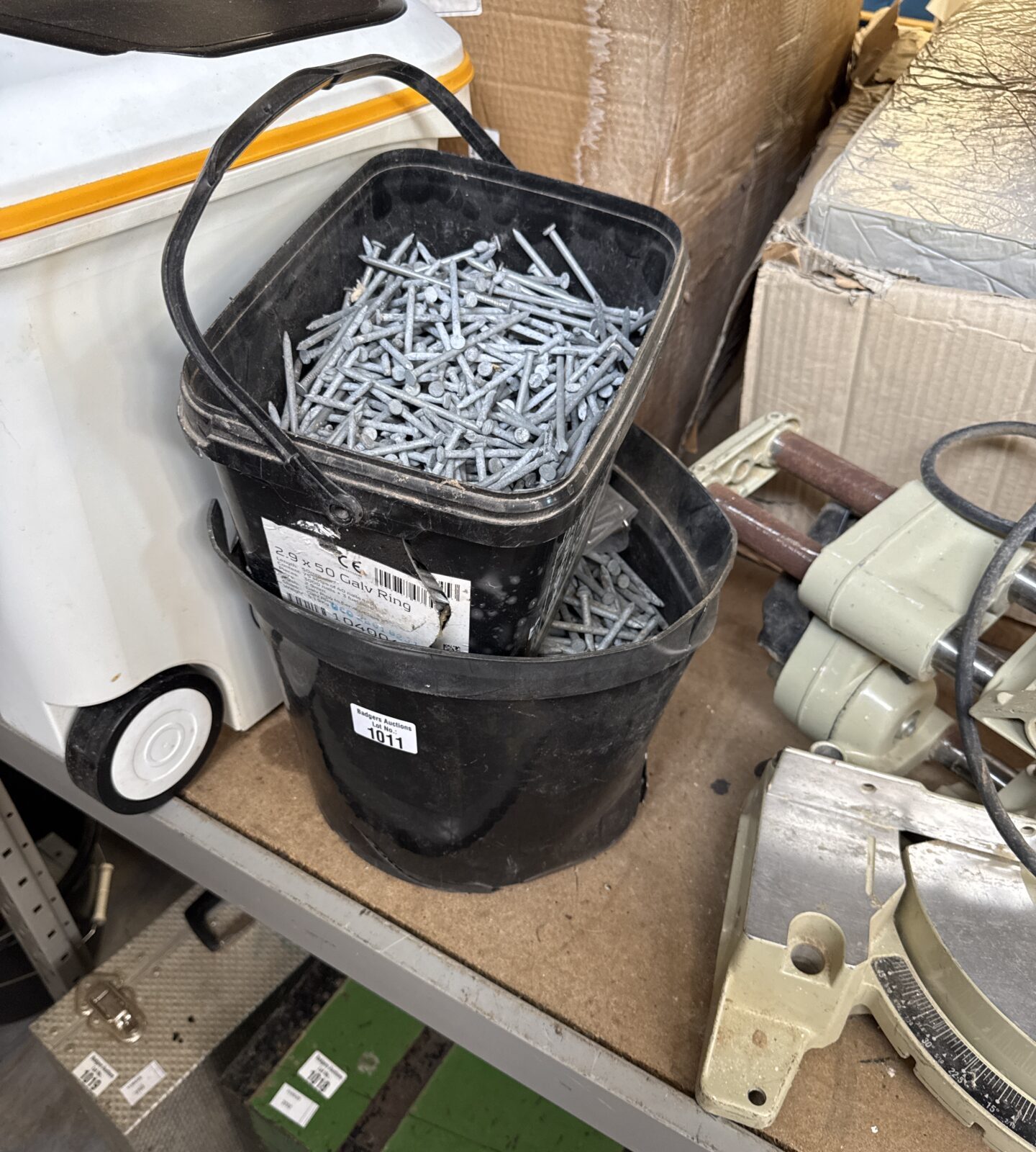 Two buckets of large nails
