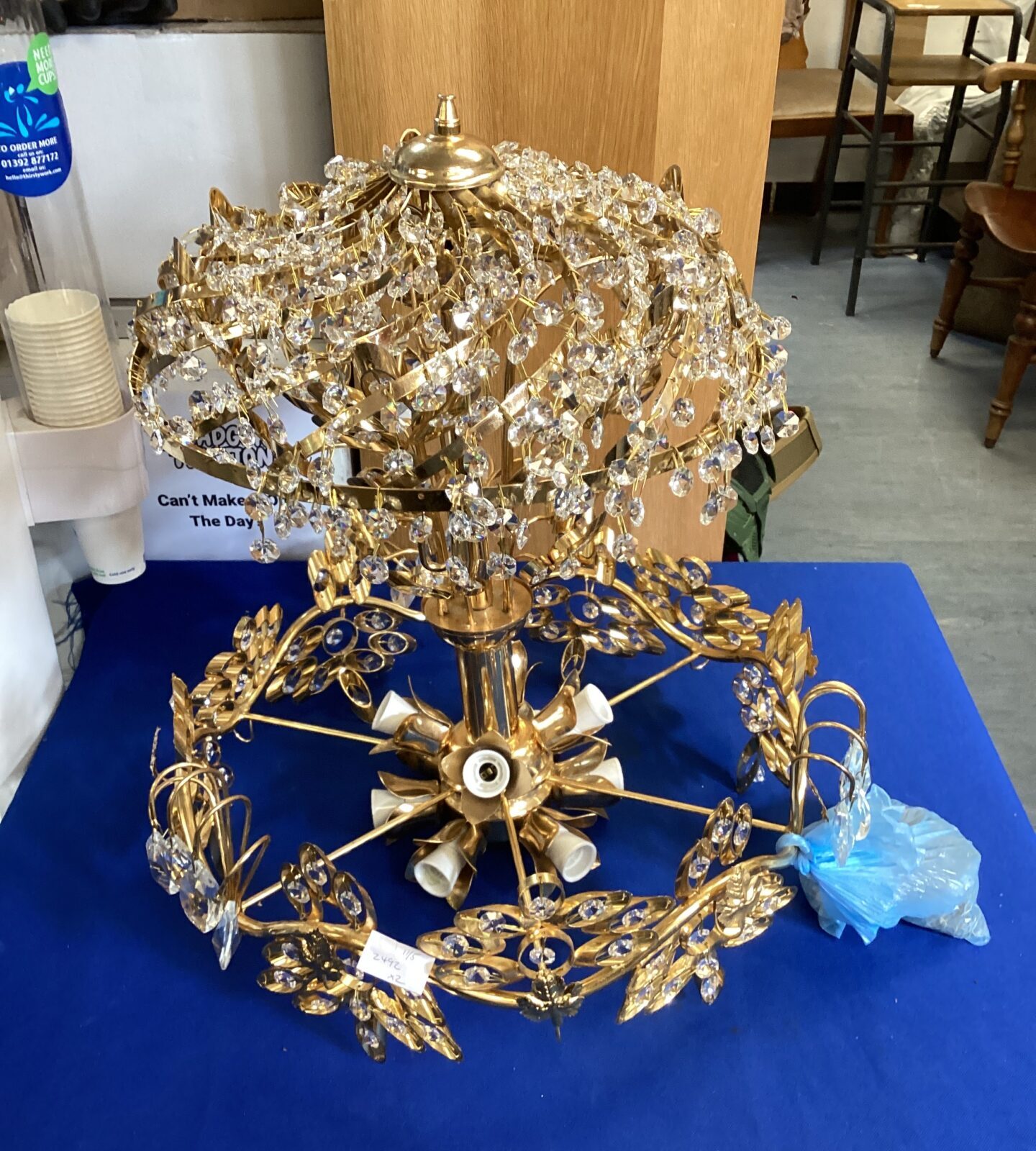 Floral patterned chandelier with spares pendants