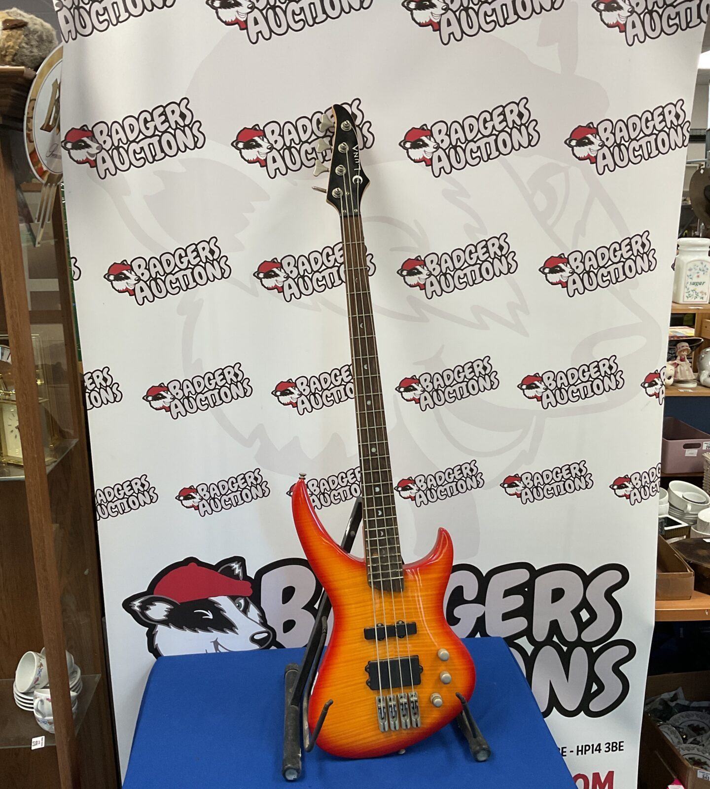 Red & orange luna bass guitar