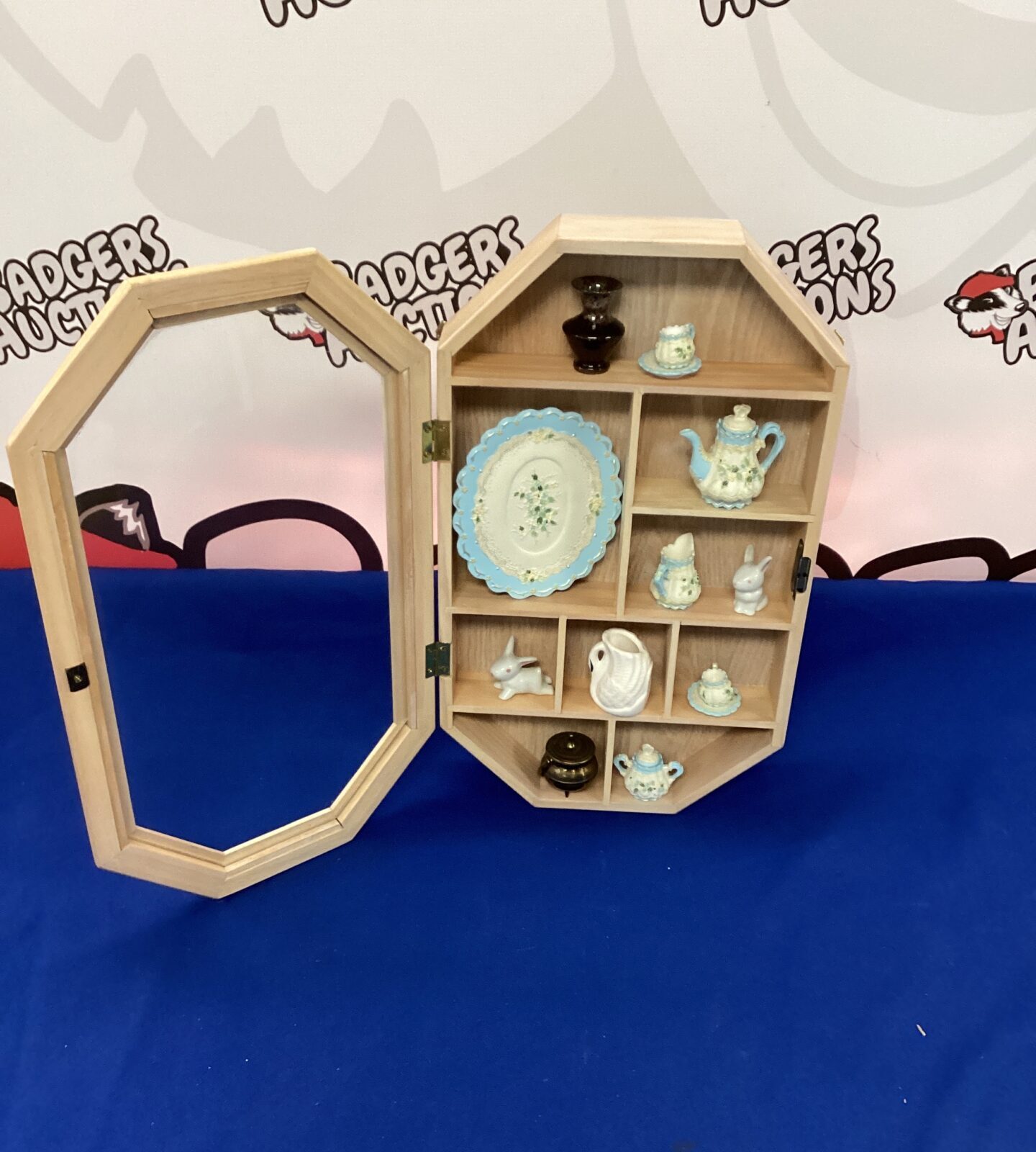 Wooden cabinet with contents