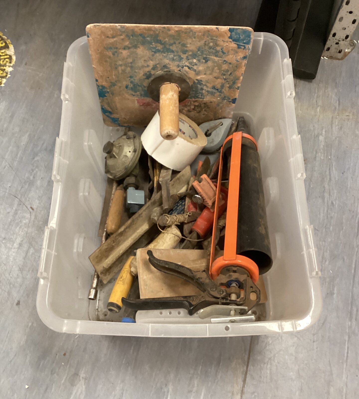 Box of builders tools inc plasterer’s mug board
