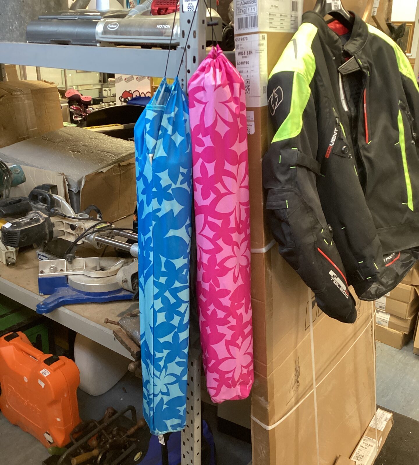 Blue folding camping chair with pink folding camping chair