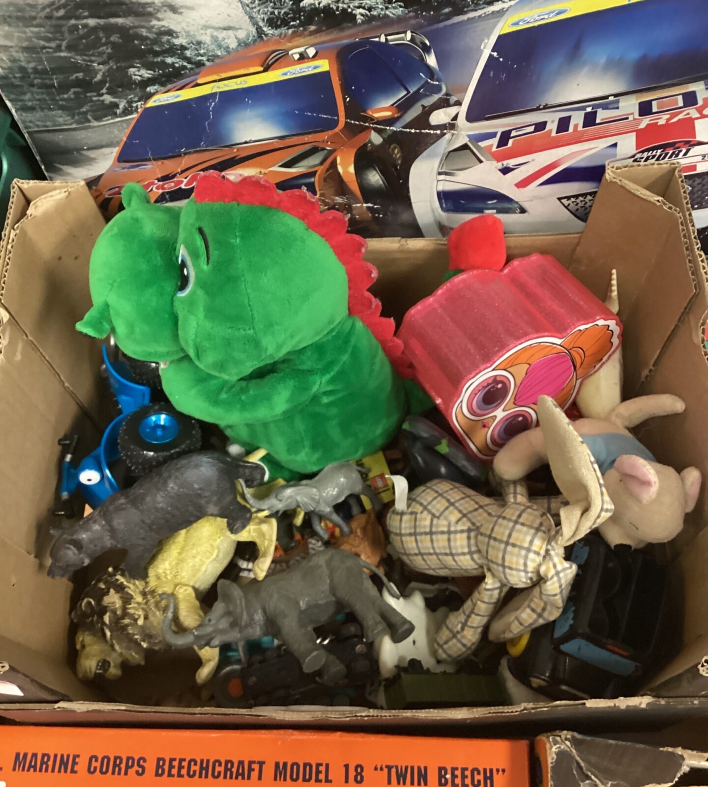 Box of toys including animals