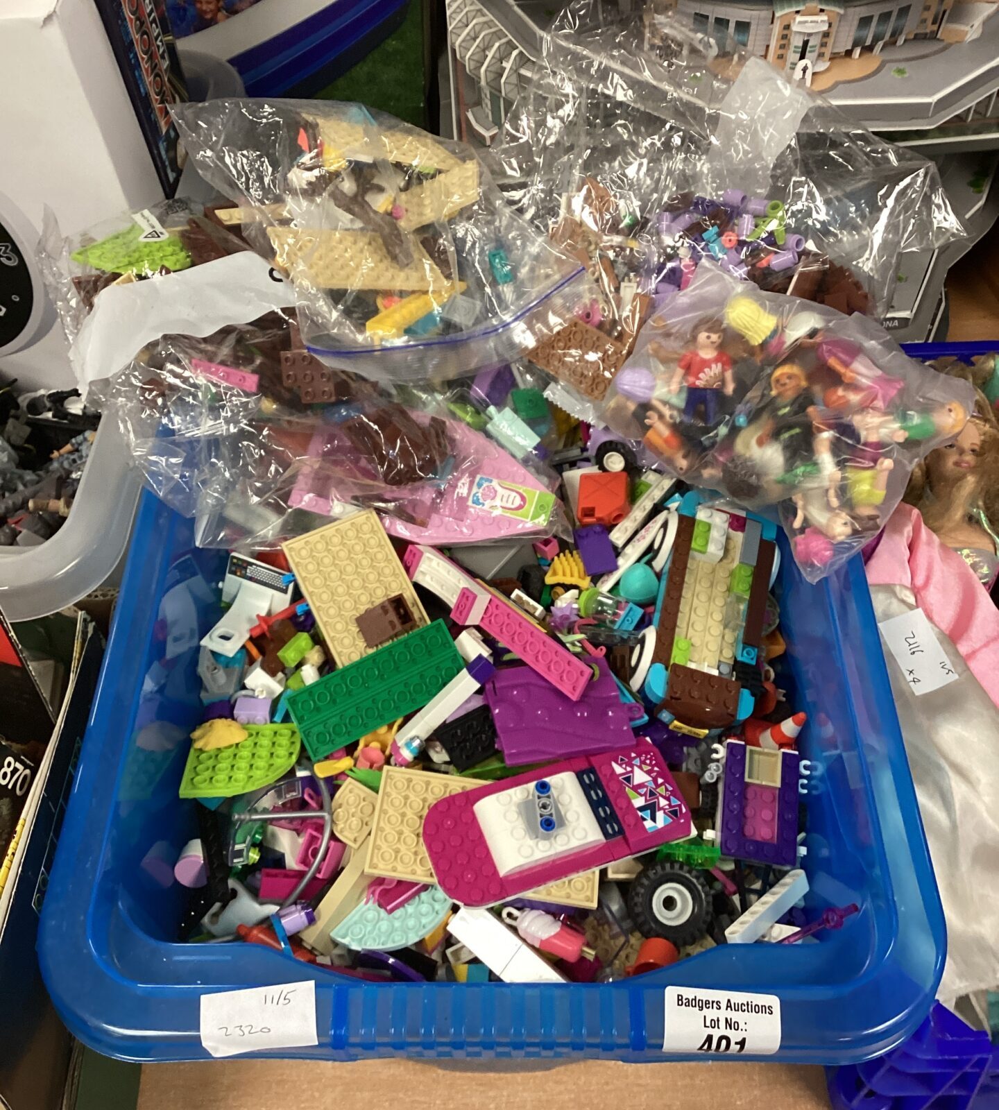 Box of girls lego & bag of playmobil figures