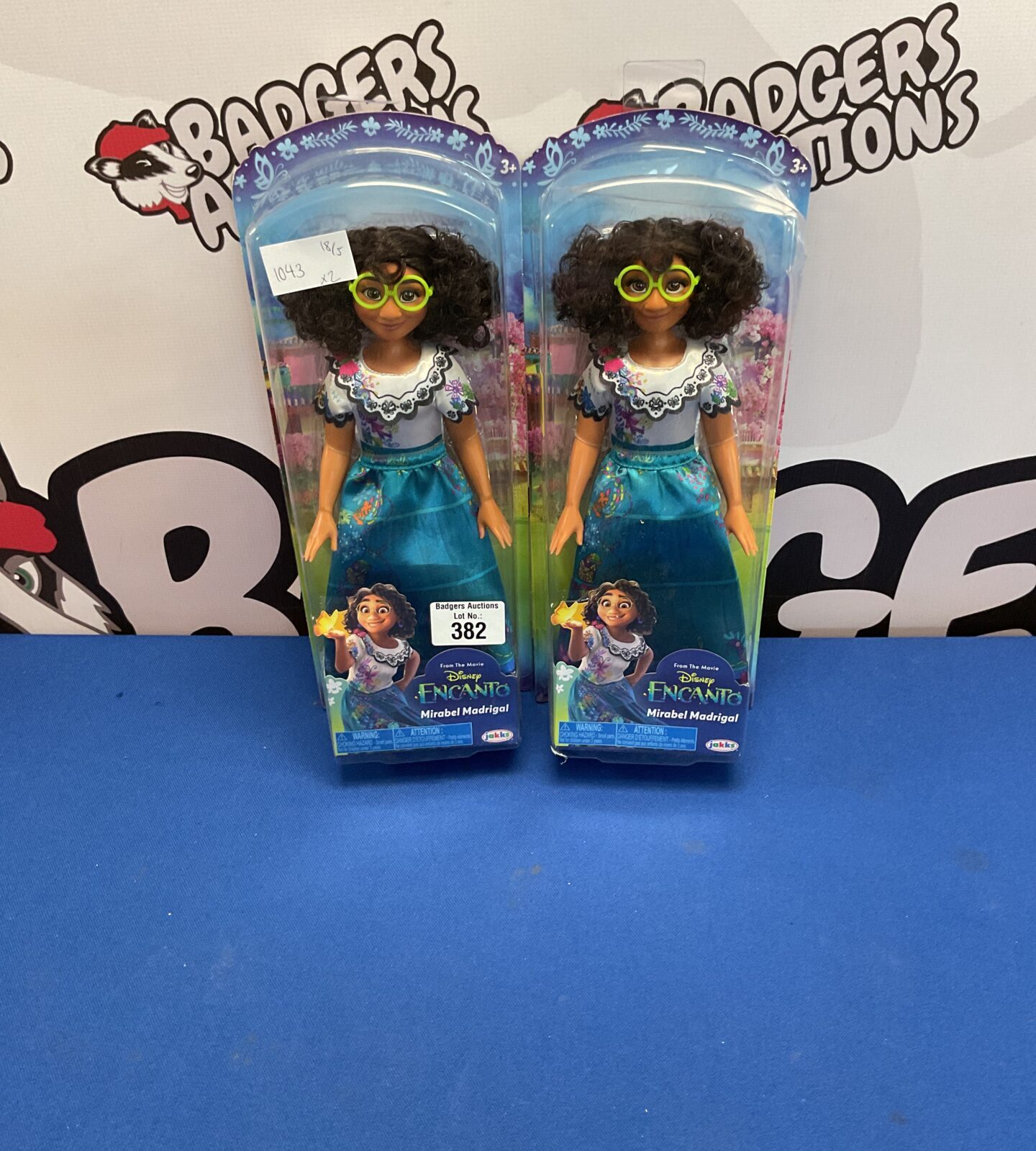 Two boxed disney encanto mirabel madrigal figures