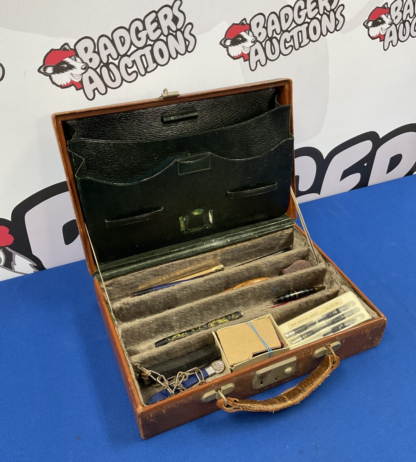 Vintage leather stationery case with contents