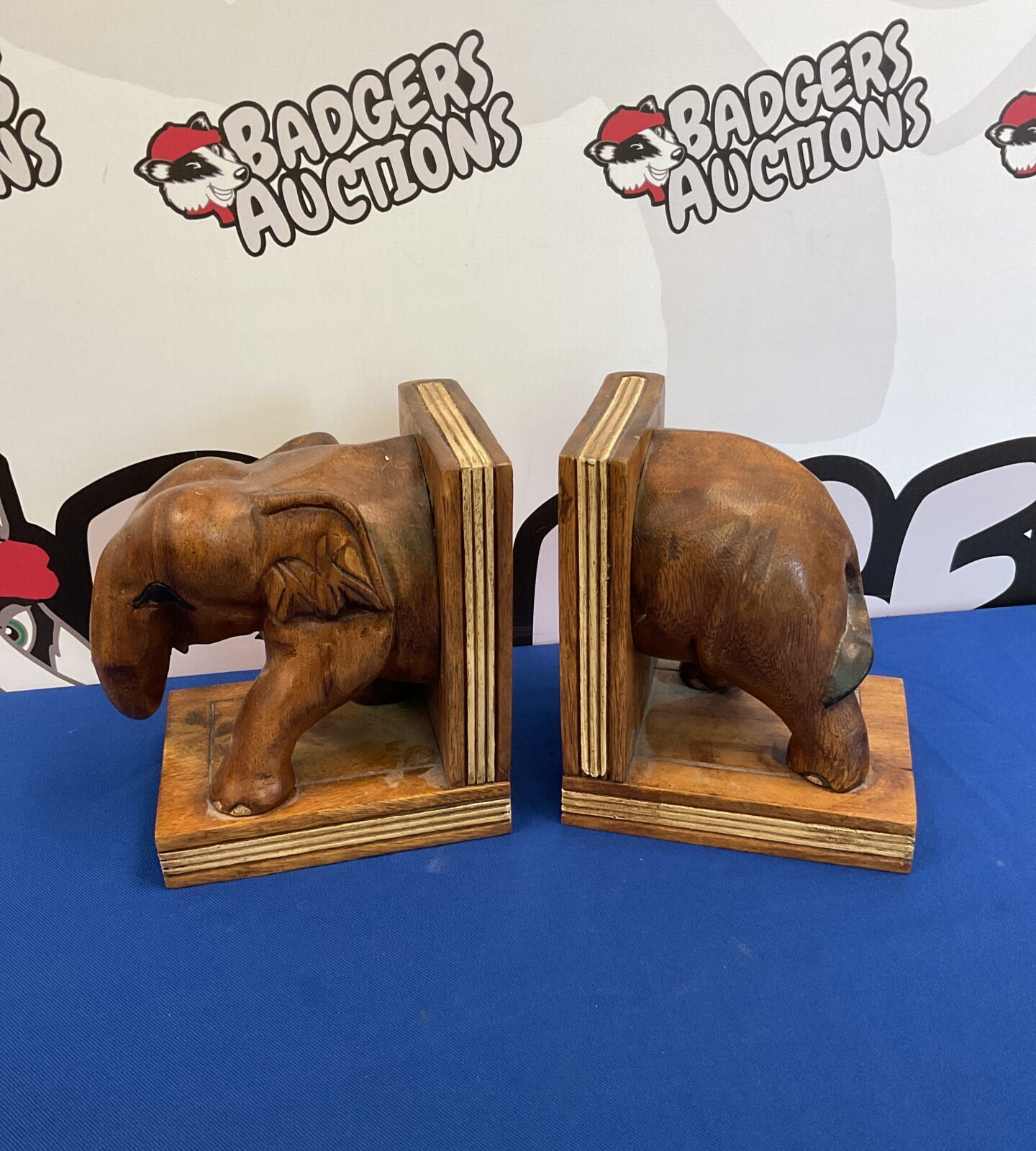Carved wooden elephant book ends