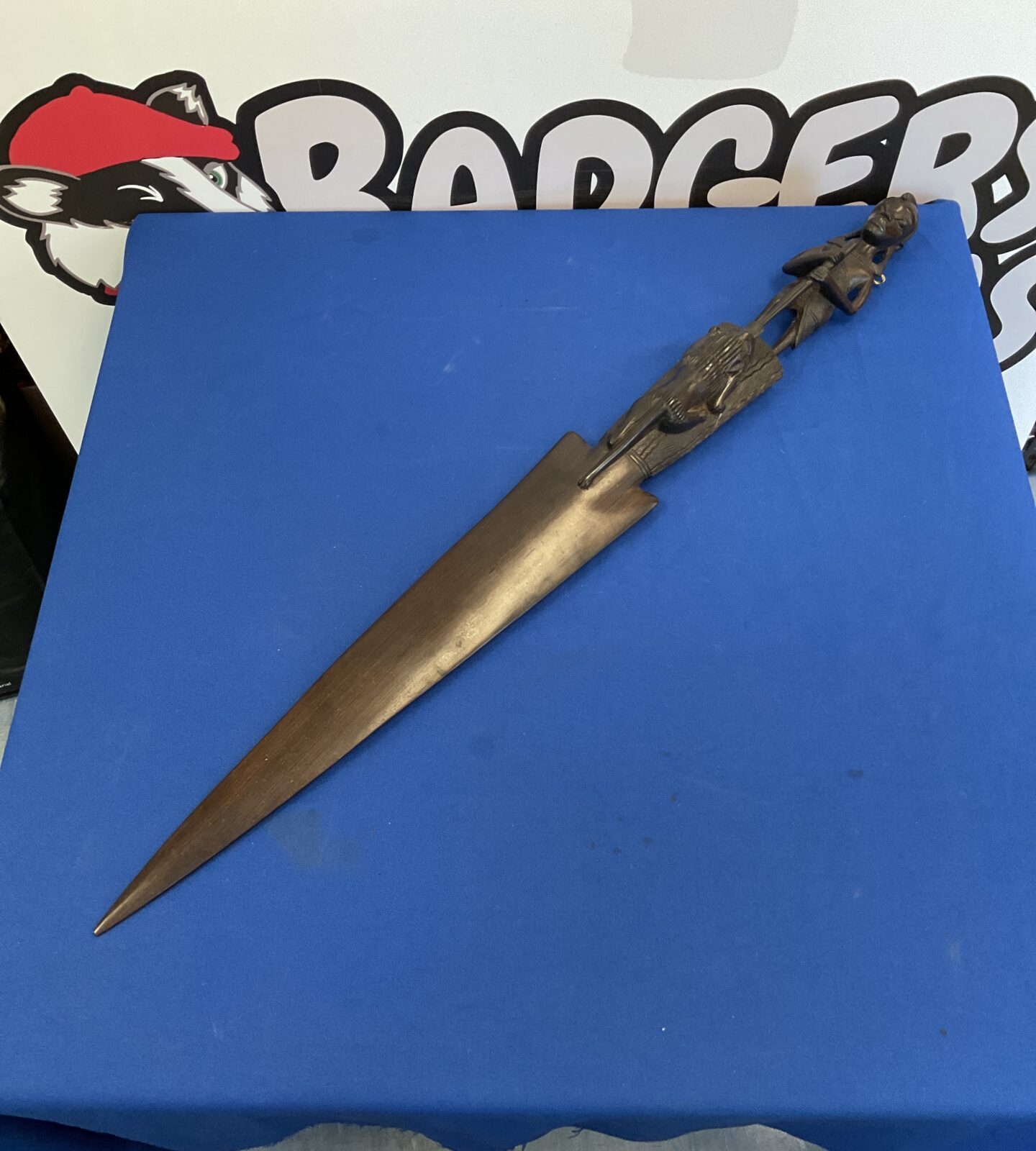 Carved African hardwood lion hunter spear head