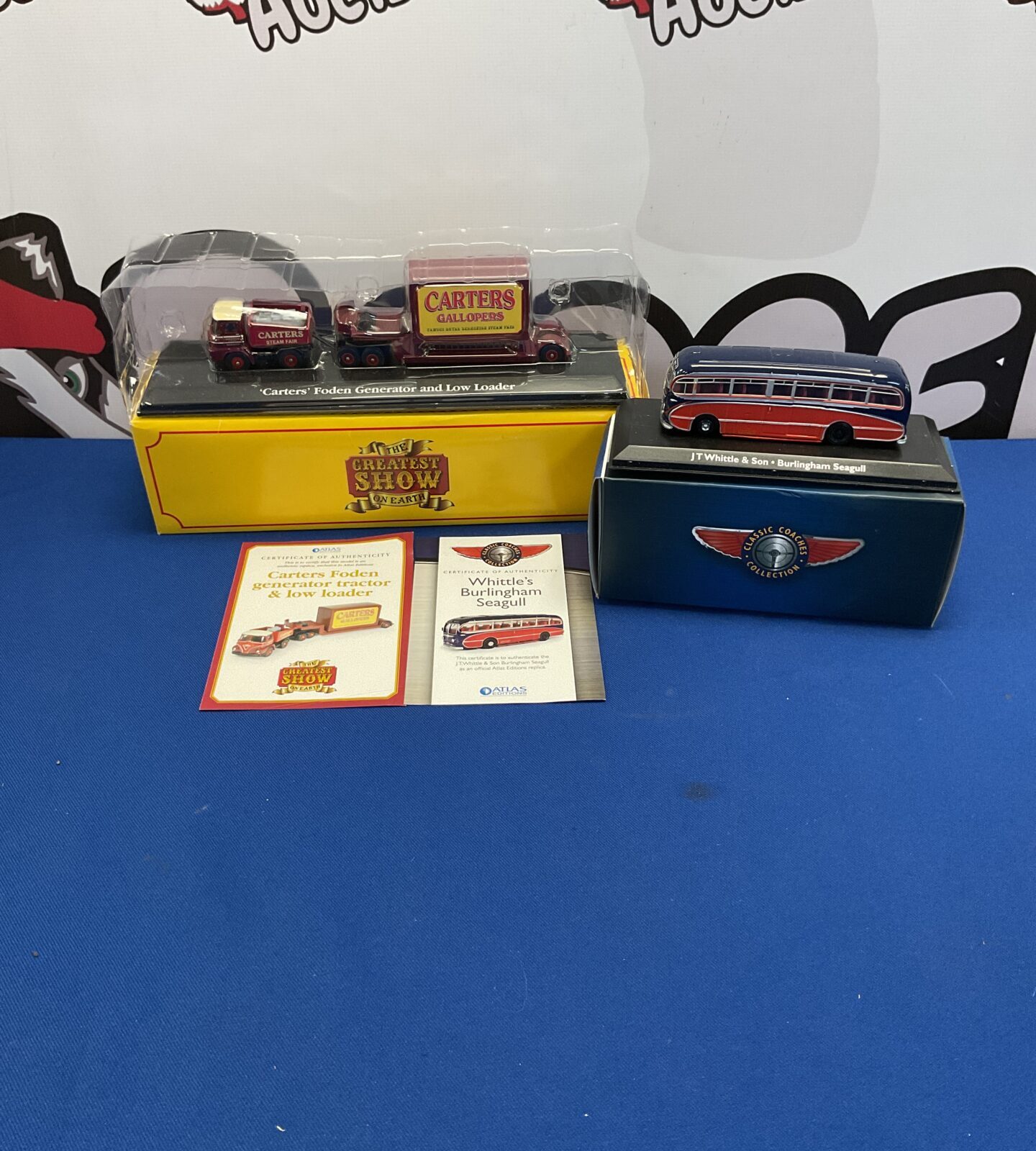 Two boxed diecast models inc atlas and the greatest show with authenticity