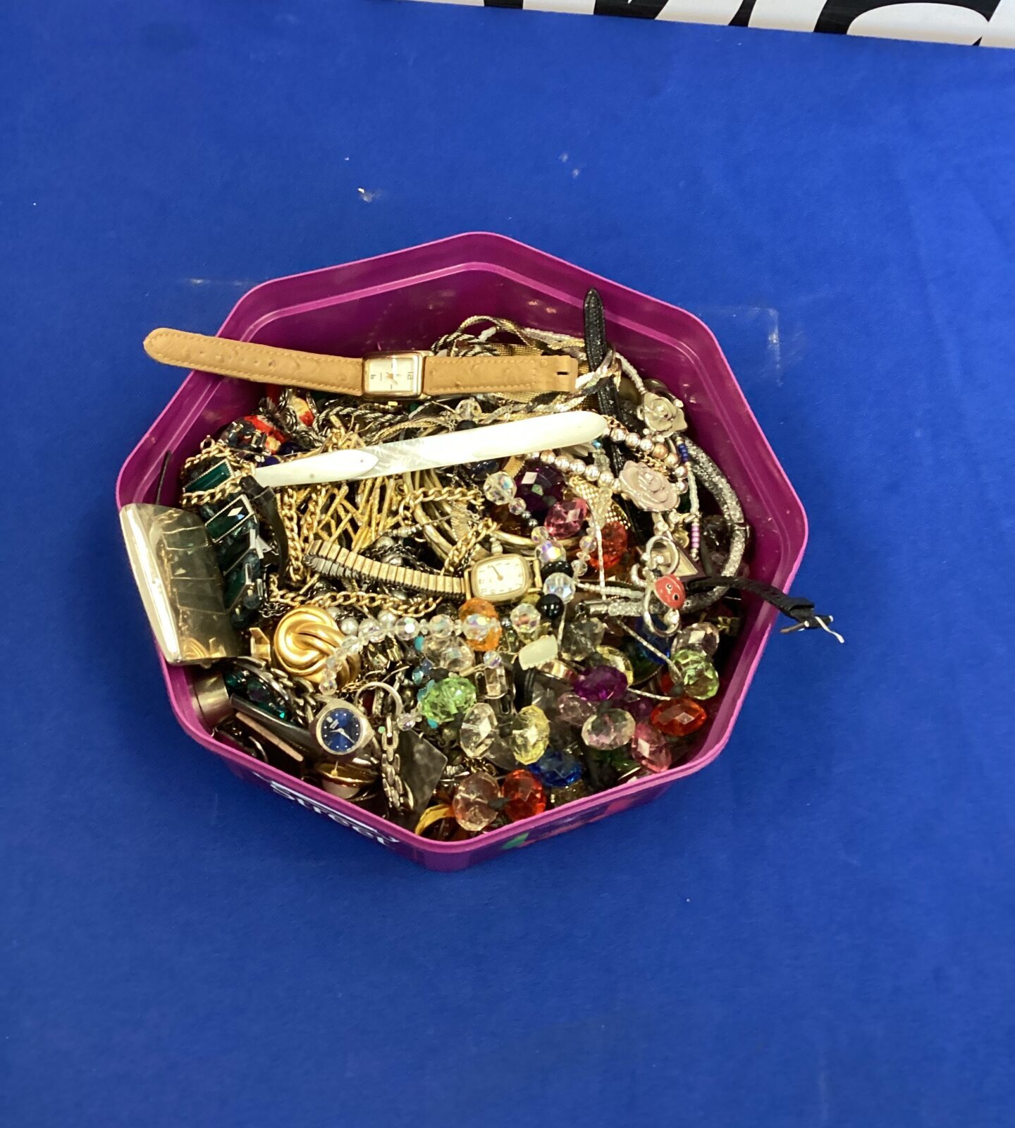 Tub of mixed jewellery and watches
