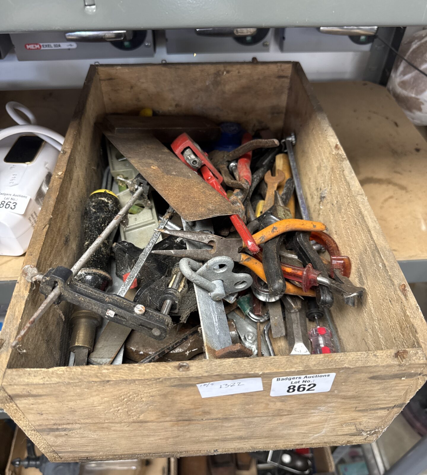 Wooden tray of mixed tools