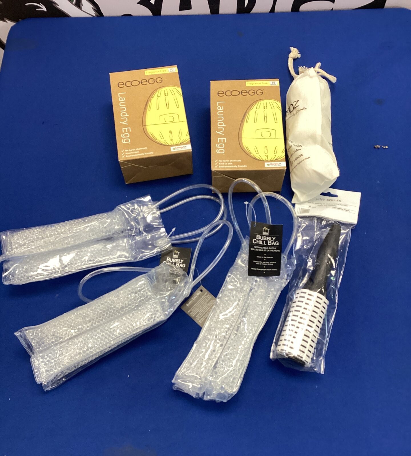 Three new bubbly chill bags, lint roller, wool dryer balls & two eco eggs laundry eggs