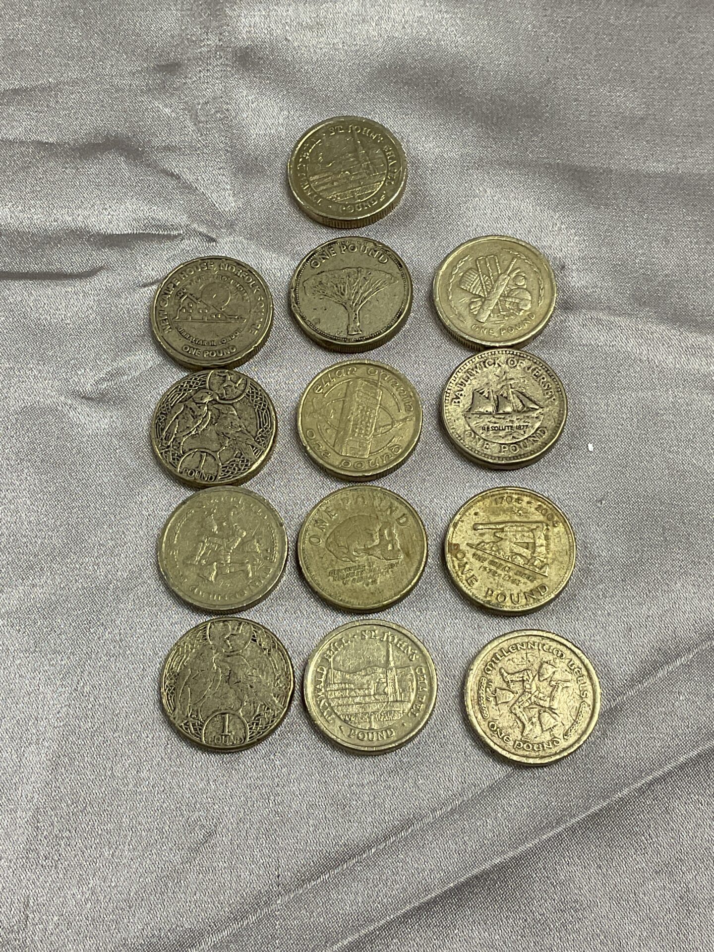13 commemerative pound coins