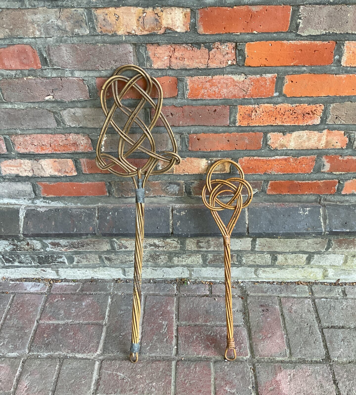 Two vintage carpet beaters