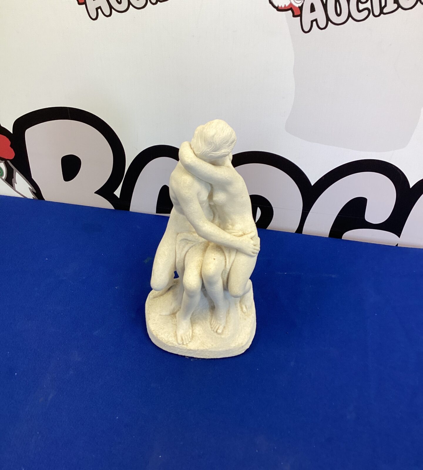 Kissing couple figurine 8” tall