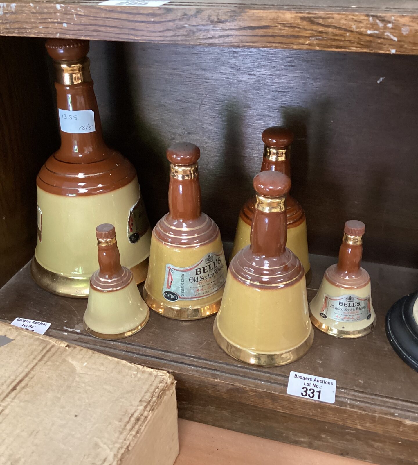 Selection of pottery Bells Bottles