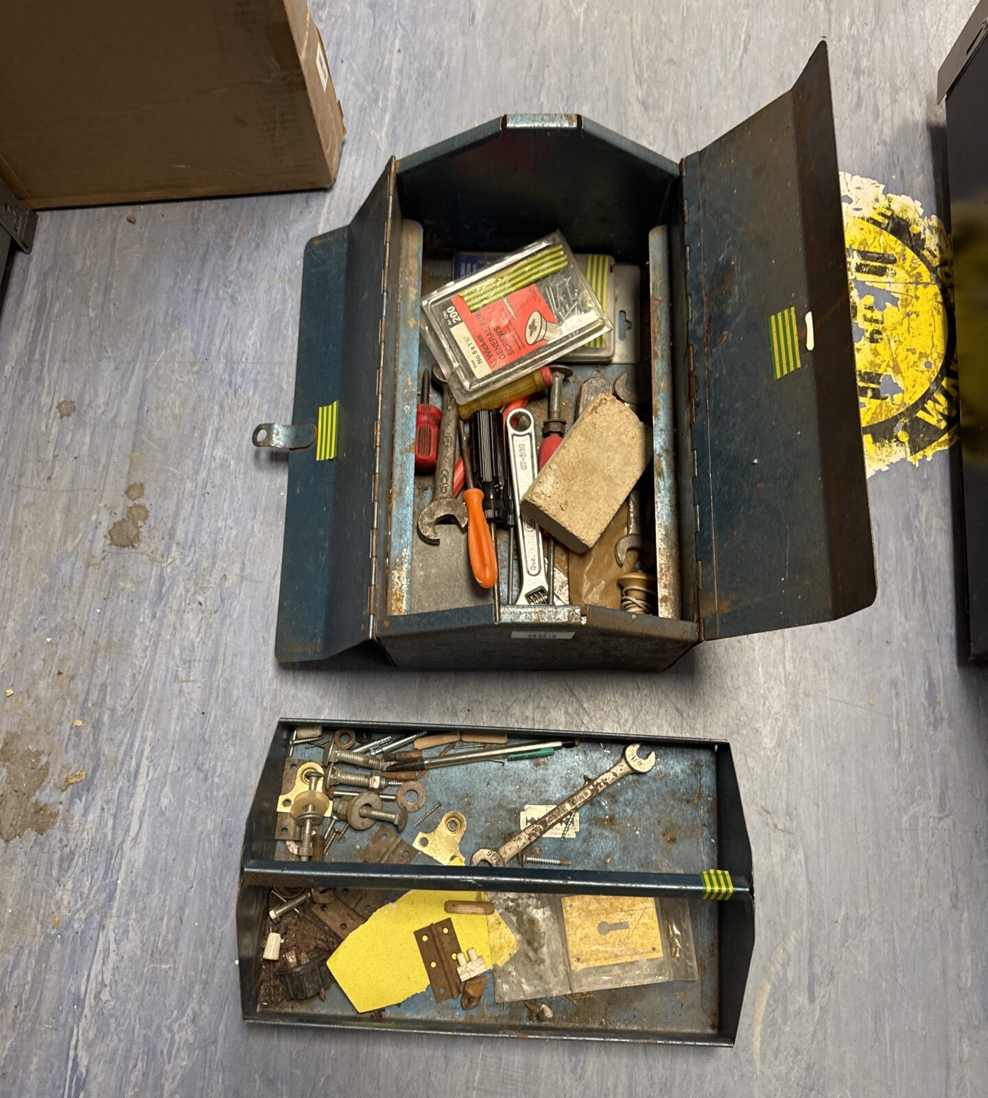Small metal toolbox with contents