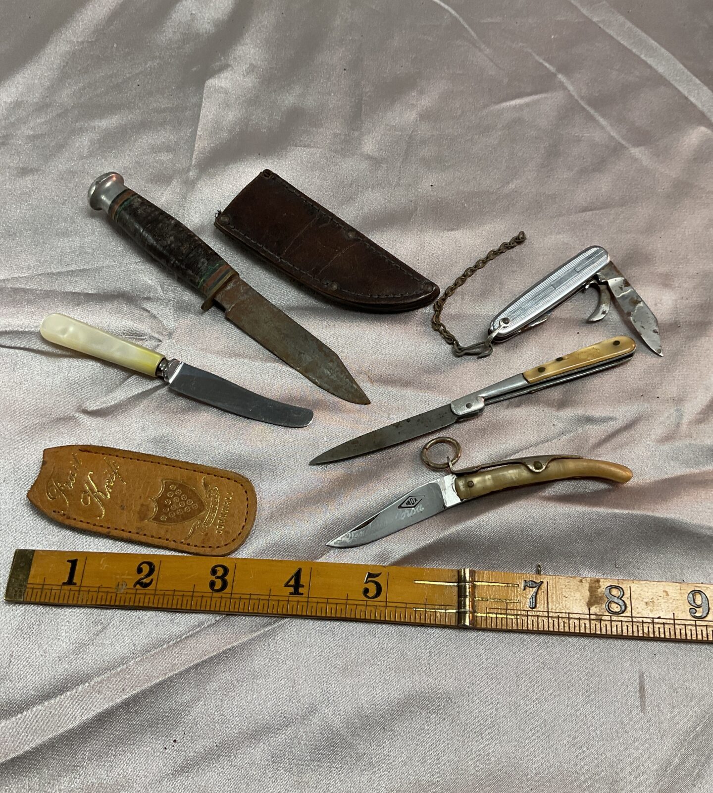 Selection of vintage penknives fruit knife and sheath knife