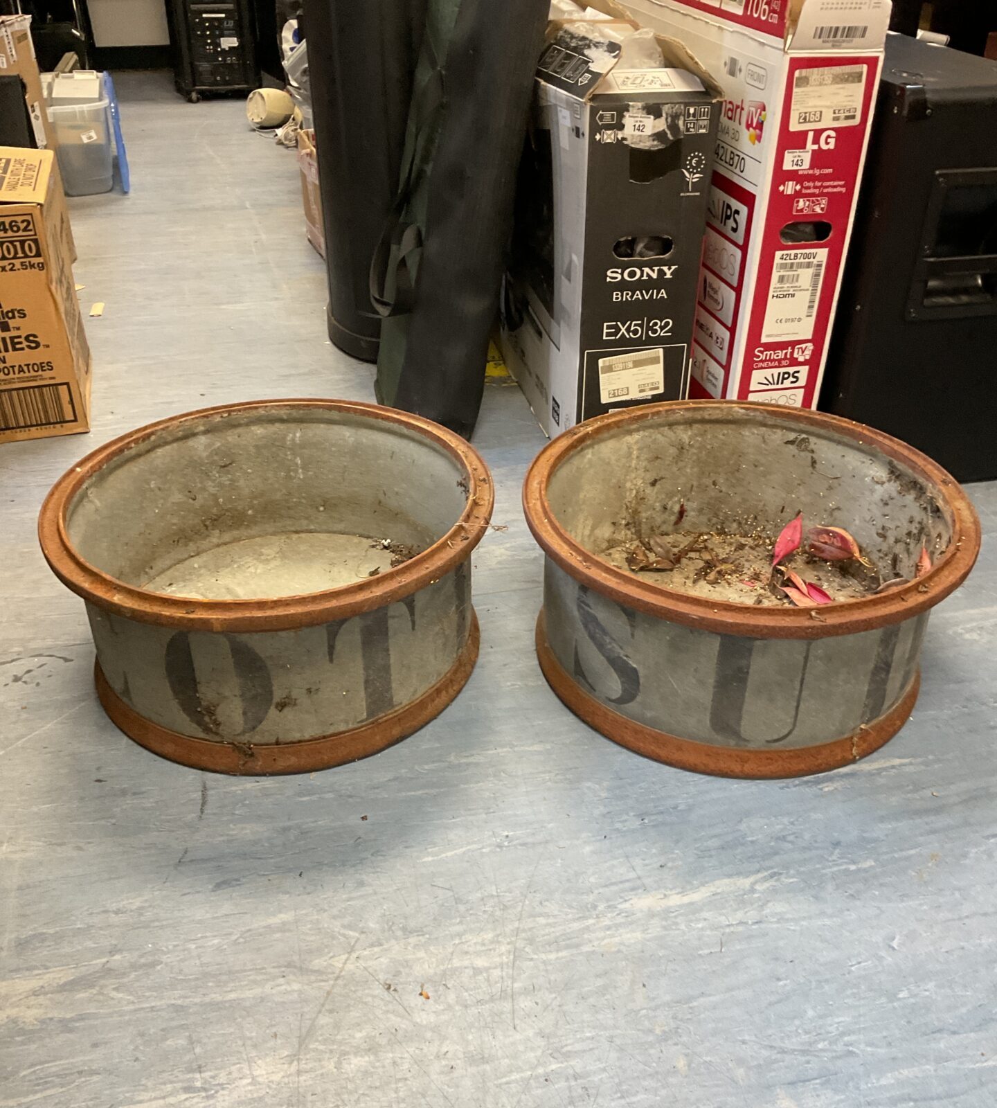Two large vintage galvanised planters