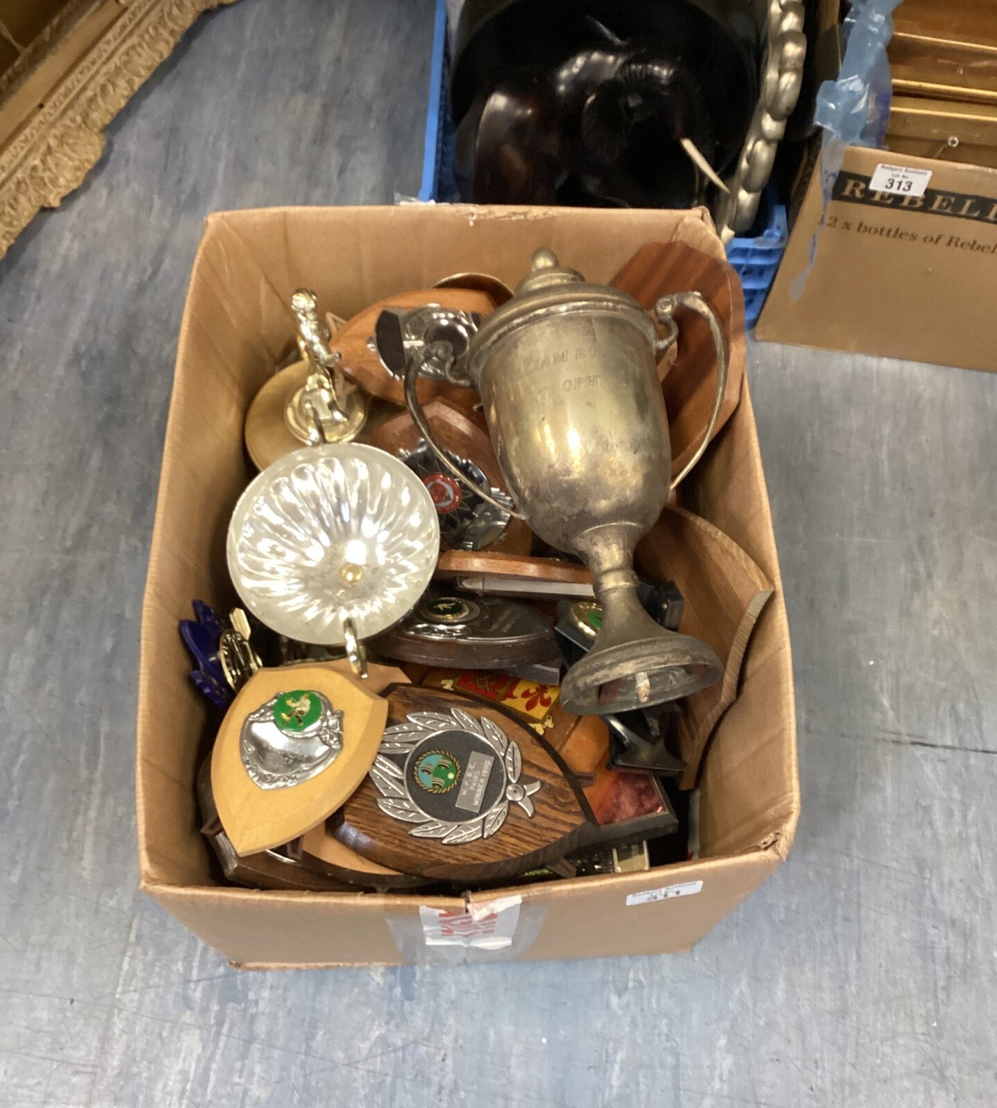 Box of mixed trophies and shields