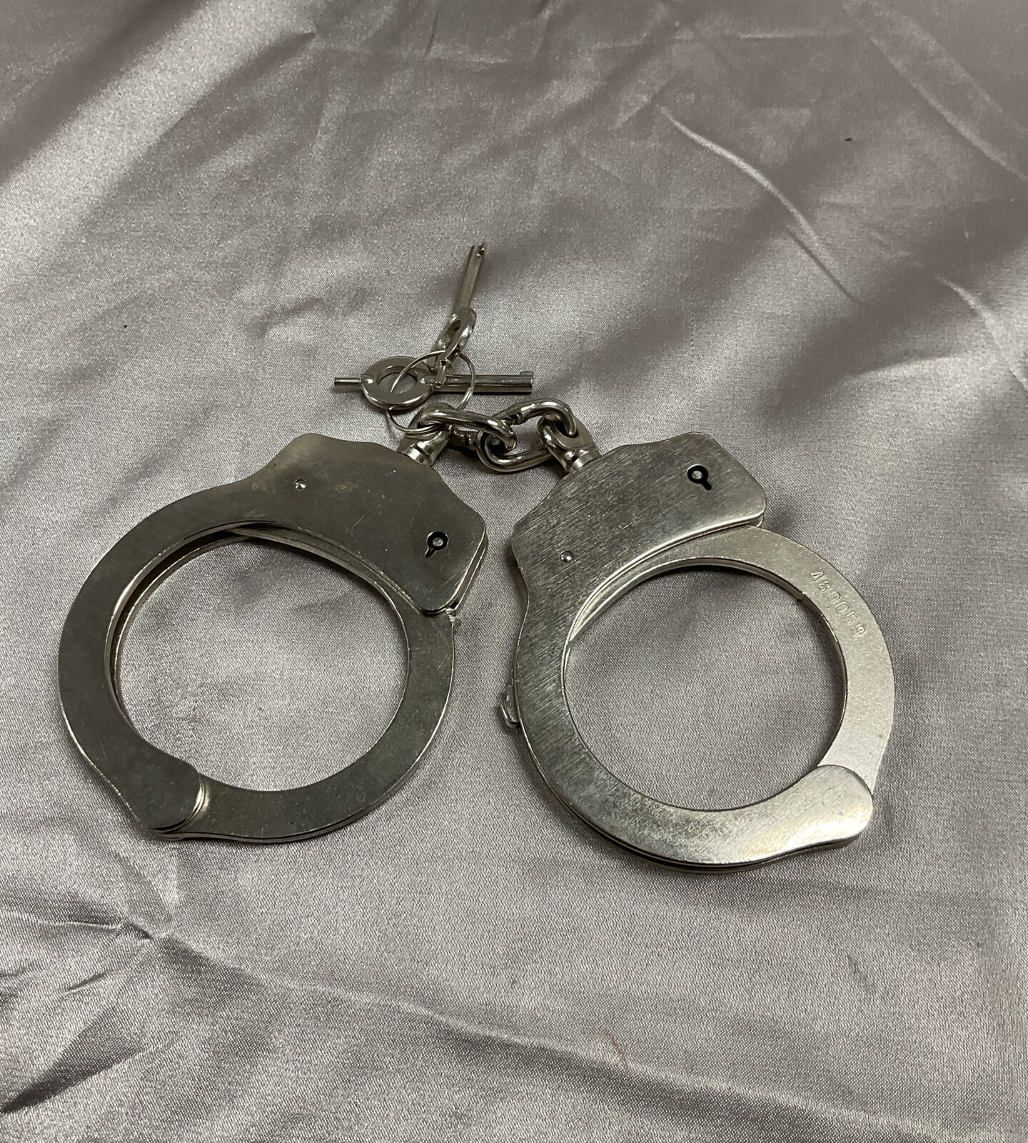Pair of handcuffs with keys