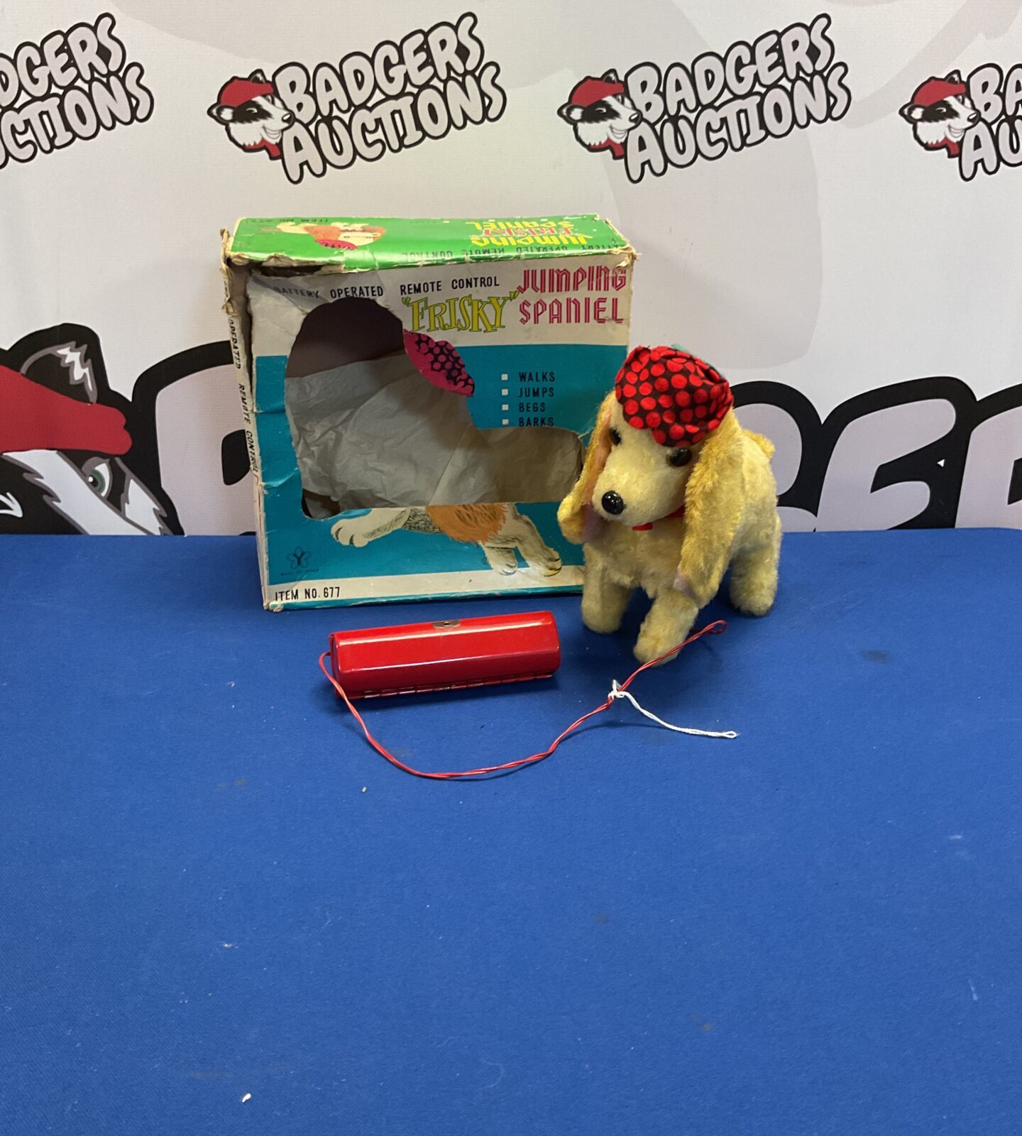 Vintage boxed battery operated remote controlled frisky jumping spaniel toy