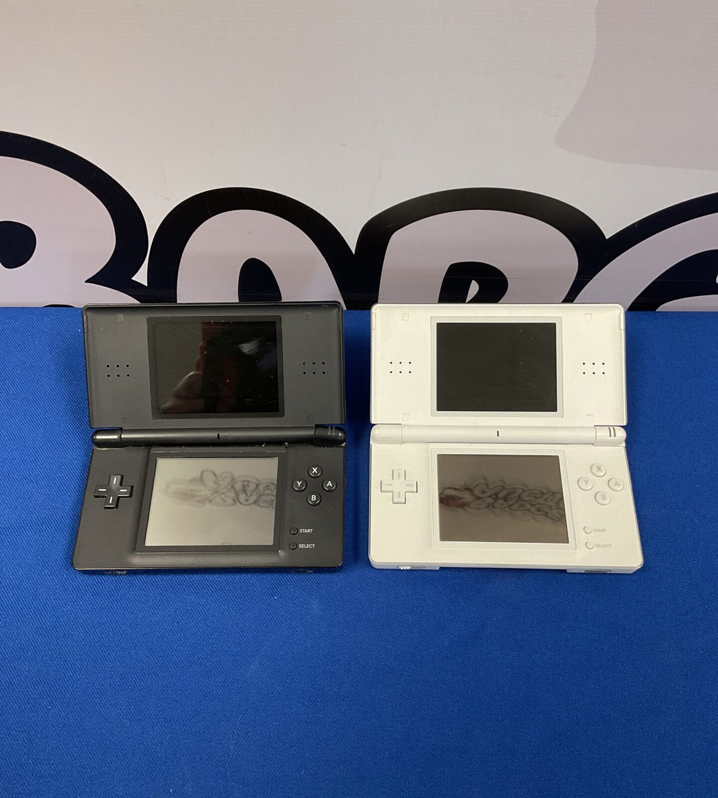 Two nintendo ds lite consoles