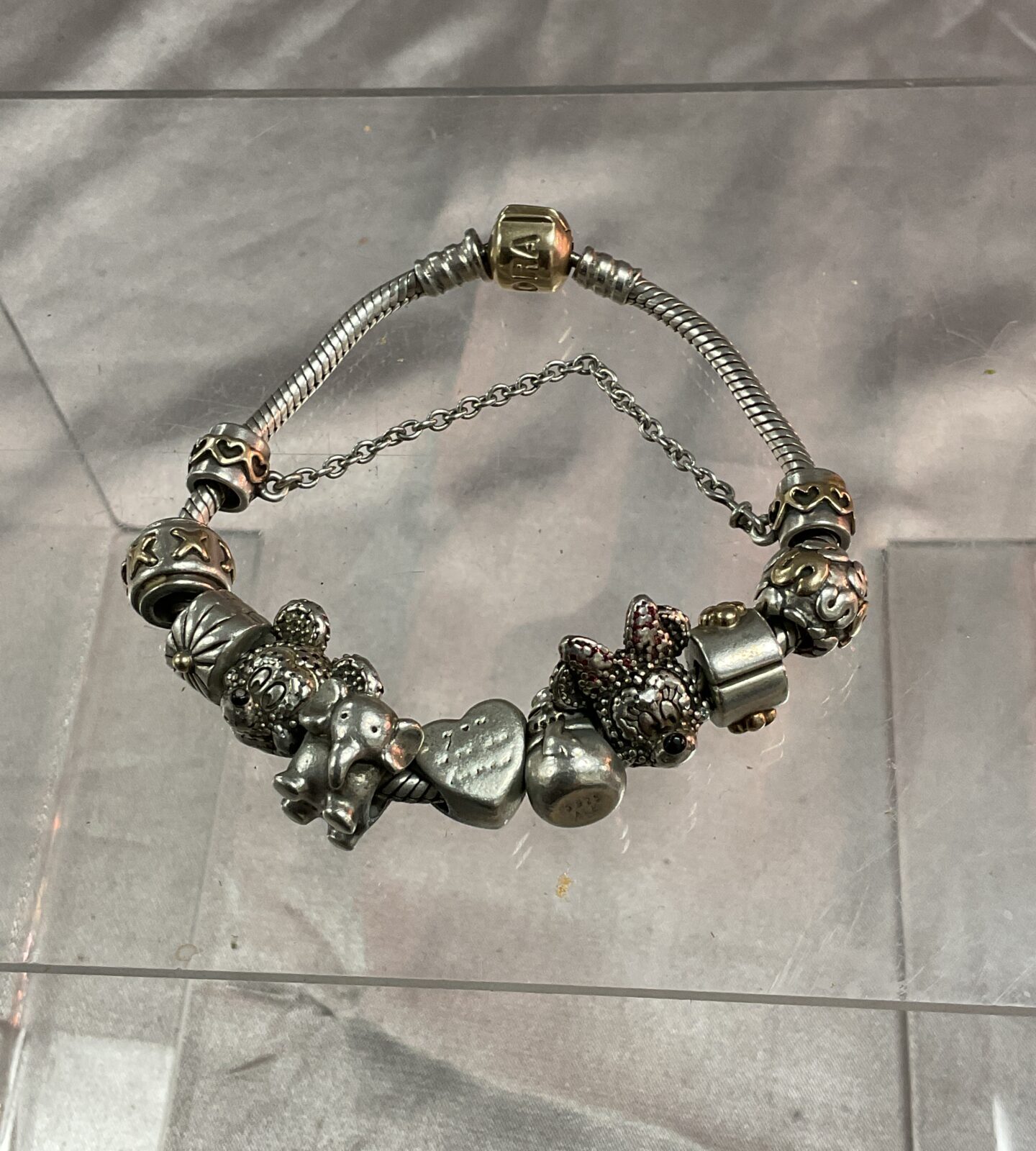 Pandora Silver Bracelet with. 14ct 585 Gold clasp with Mickey and mini mouse and seven other charms and safety chain
