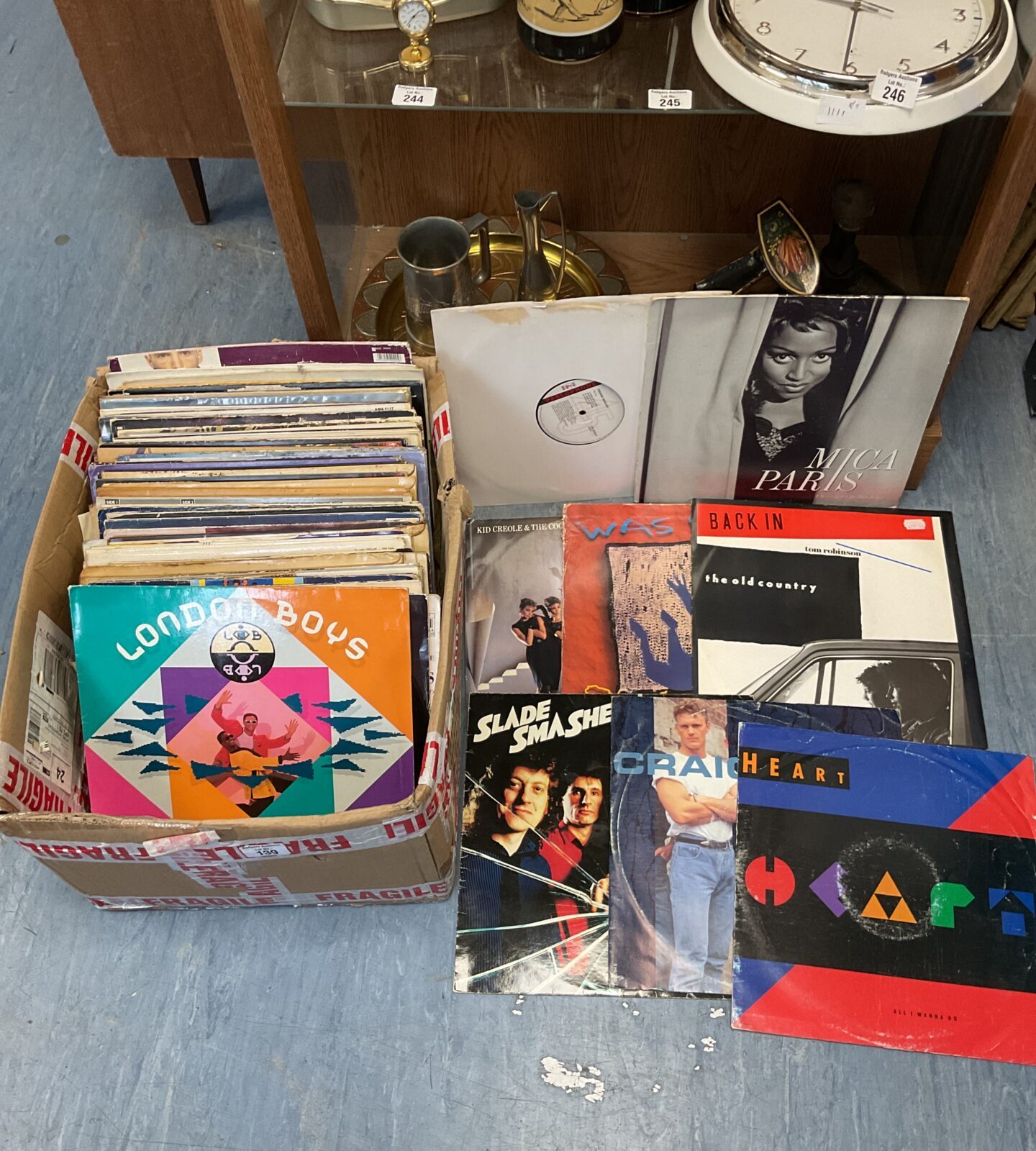 Collection of 12” vinyl records including freddie mercury