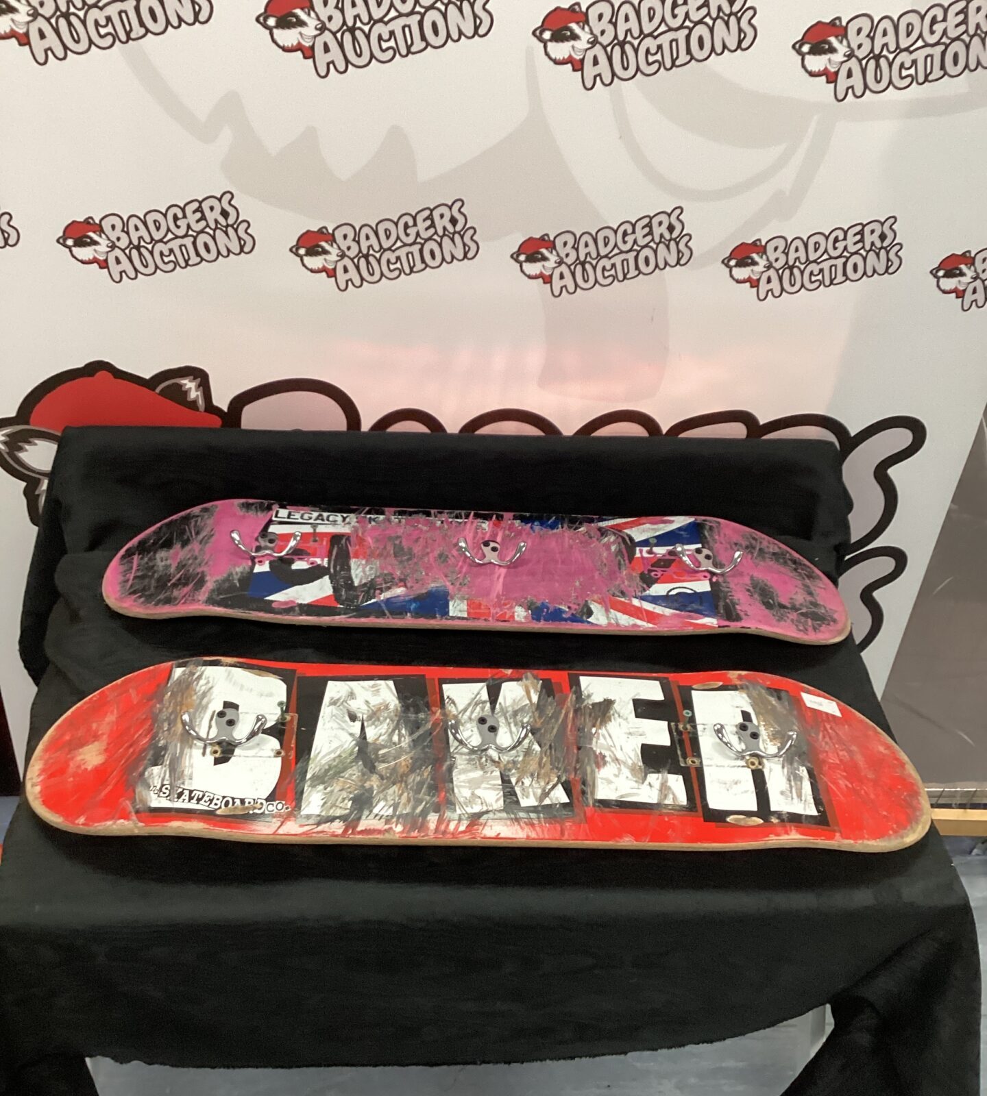 Two re provisioned skateboards coat hooks