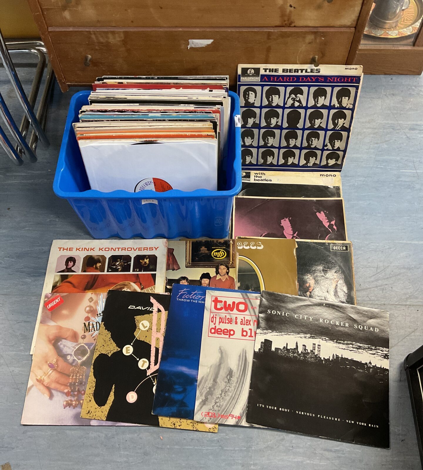 Box of 12” vinyl records including the beatles & david bowie