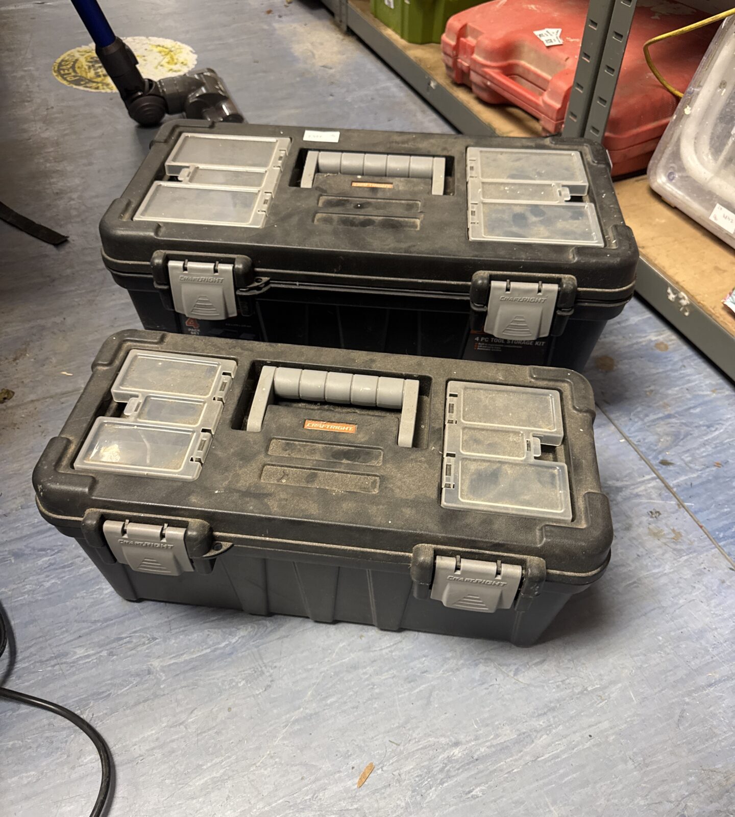 Two empty craft right toolboxes