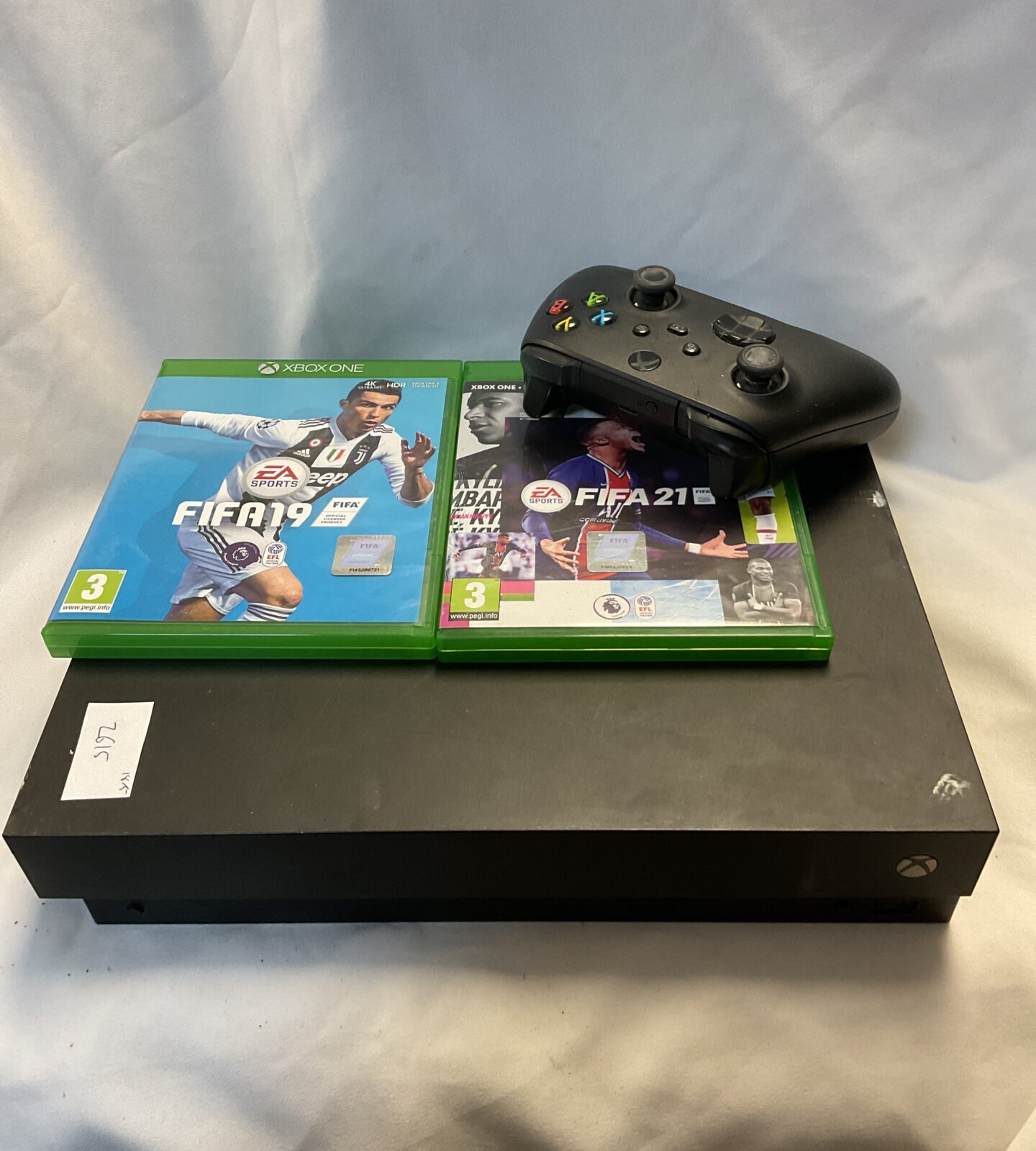 Microsoft xbox one x console with controller & games
