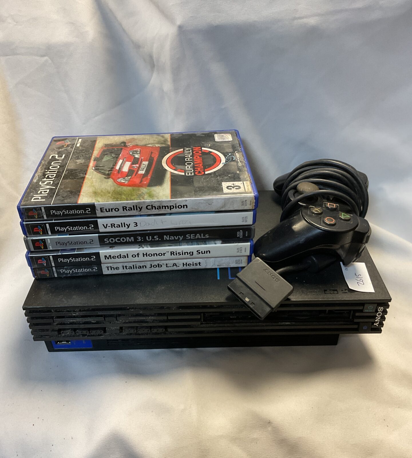 Sony PlayStation 2 console with games