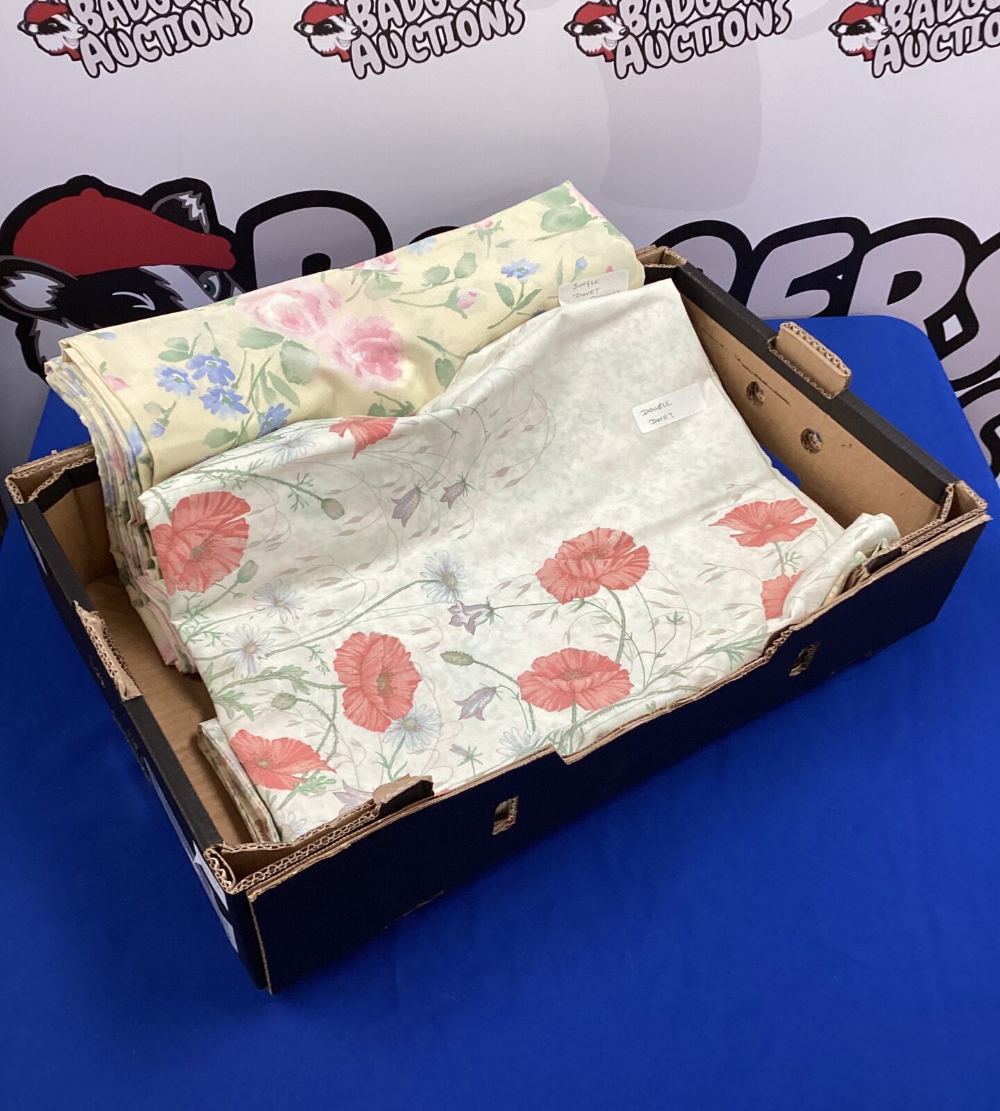 Double duvet with pillow cases & single duvet with pillow case both floral patterned