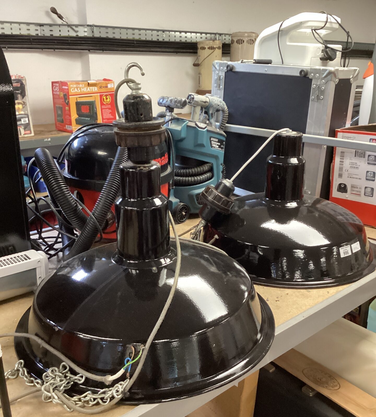 Pair of large enamelled industrial lamps