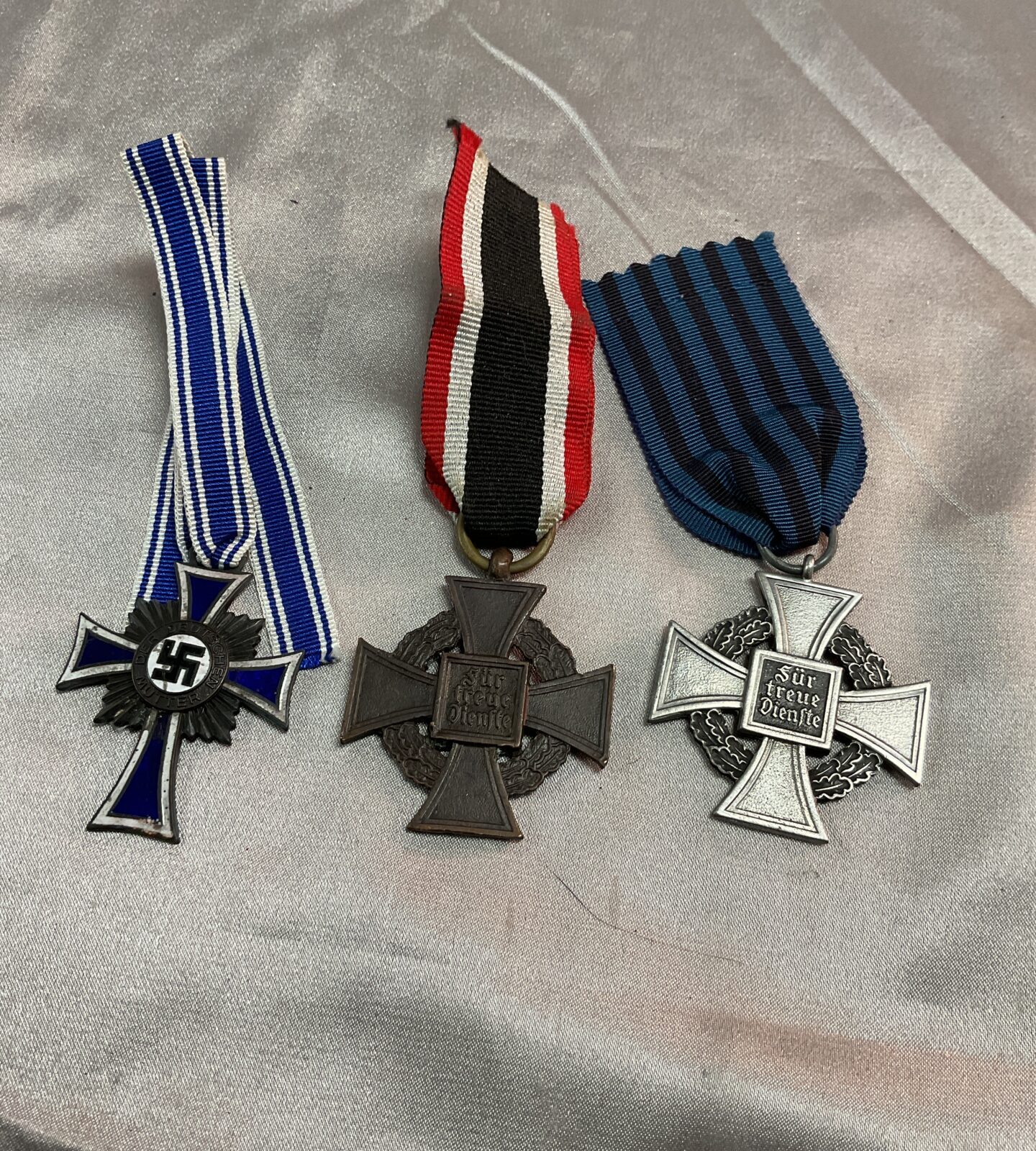 Three German War Medals Two Faithfully service and bronze mothers cross